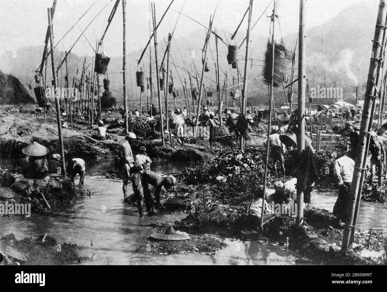 Burma/Myanmar: A 1905 photograph of workers at a ruby mine in Tachilek in Shan State.  Nowadays, 90% of the world's rubies come from Burma. Prized for their purity and hue, the majority of rubies are sold to Thailand. The 'Valley of Rubies', the mountainous Mogok area, 200 km north of Mandalay, is noted for its rare pigeon's blood rubies and blue sapphires. Human rights groups, however, have slammed the working conditions in the mines as horrendous. Stock Photo