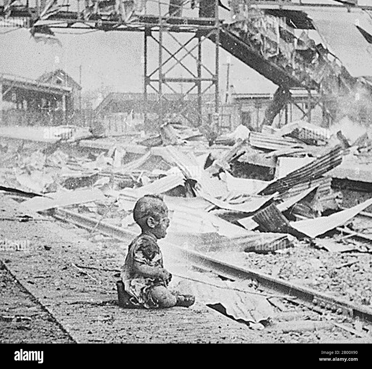 China: 'Bloody Saturday'. A terrified Chinese baby, one of the last humans left alive after intense bombing during the Japanese attack on Shanghai's South Station. August 1937.  The Second Sino-Japanese War (July 7, 1937 – September 9, 1945) was a military conflict fought primarily between the Republic of China and the Empire of Japan. After the Japanese attack on Pearl Harbor, the war merged into the greater conflict of World War II as a major front of what is broadly known as the Pacific War. Although the two countries had fought intermittently since 1931, total war started in 1937. Stock Photo