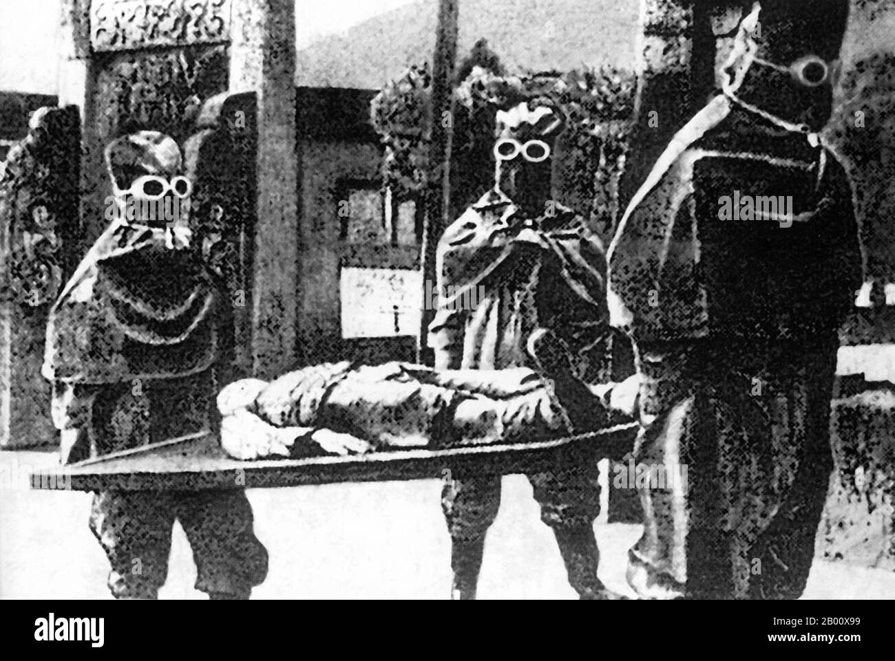 China: Japanese staff carrying a corpse at Unit 731 in Northeast China (1937-1945).  Unit 731 was a covert biological and chemical warfare research and development unit of the Imperial Japanese Army that undertook lethal human experimentation during the Second Sino-Japanese War (1937–1945) and World War II. It was responsible for some of the most notorious war crimes carried out by Japanese personnel. Unit 731 was the code name of an Imperial Japanese Army unit officially known as the Epidemic Prevention and Water Purification Department of the Kwantung Army. Stock Photo