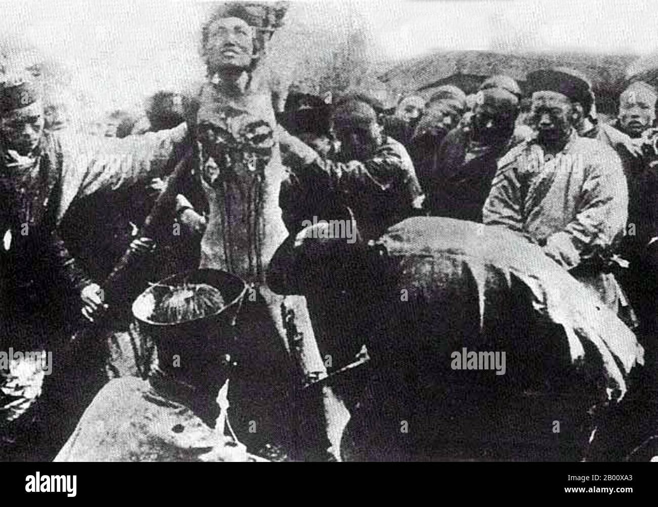 China: An execution by the 'Death of a Thousand Cuts', late Qing period, c. 1905.  'Slow slicing' (pinyin: língchí, alternately transliterated Ling Chi or Leng T'che), also translated as the slow process, the lingering death, or death by a thousand cuts, was a form of execution used in China from roughly 900 CE until its abolition in 1905. In this form of execution, the condemned person was killed by using a knife to methodically remove portions of the body over an extended period of time. The term língchí derives from a classical description of ascending a mountain slowly. Stock Photo