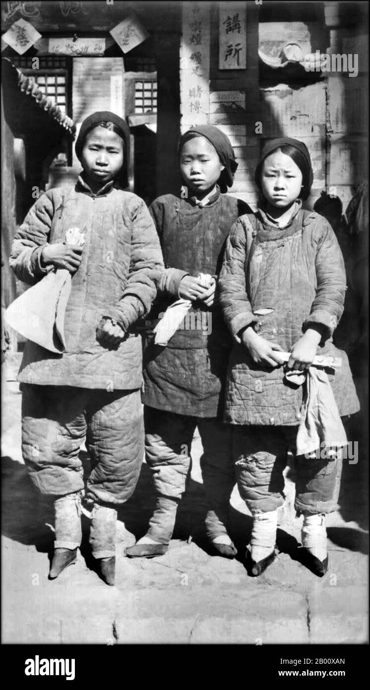 China Girls with bound feet in Shanxi. Photo by I.E. Oberholtzer c