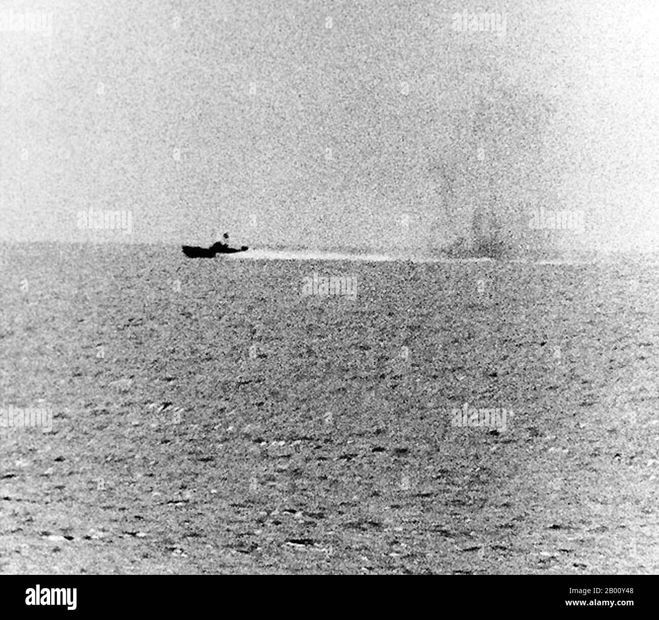 Vietnam: The Gulf of Tonkin Incident - 'North Vietnamese motor torpedo boat attacking USS Maddox, 2 August 1964'. US Navy photograph 711524.  The Gulf of Tonkin Incident, or the USS Maddox Incident, are the names given to two separate incidents, one disputed, involving North Vietnam and the United States in the waters of the Gulf of Tonkin. On August 2, 1964, the destroyer USS Maddox was engaged by three North Vietnamese Navy torpedo boats of the 135th Torpedo Squadron. A sea battle resulted, in which the Maddox expended over 280 3' and 5' shells. Stock Photo