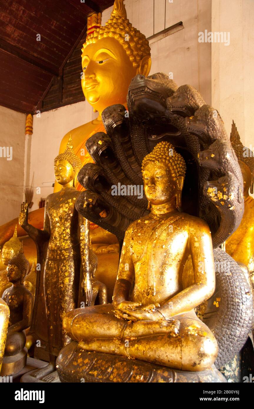 Thailand: Buddhas in the main viharn, Wat Phra Si Rattana Mahathat Chaliang, Si Satchanalai Historical Park.  Si Satchanalai was built between the 13th and 15th centuries and was an integral part of the Sukhothai Kingdom. It was usually administered by family members of the Kings of Sukhothai. Stock Photo