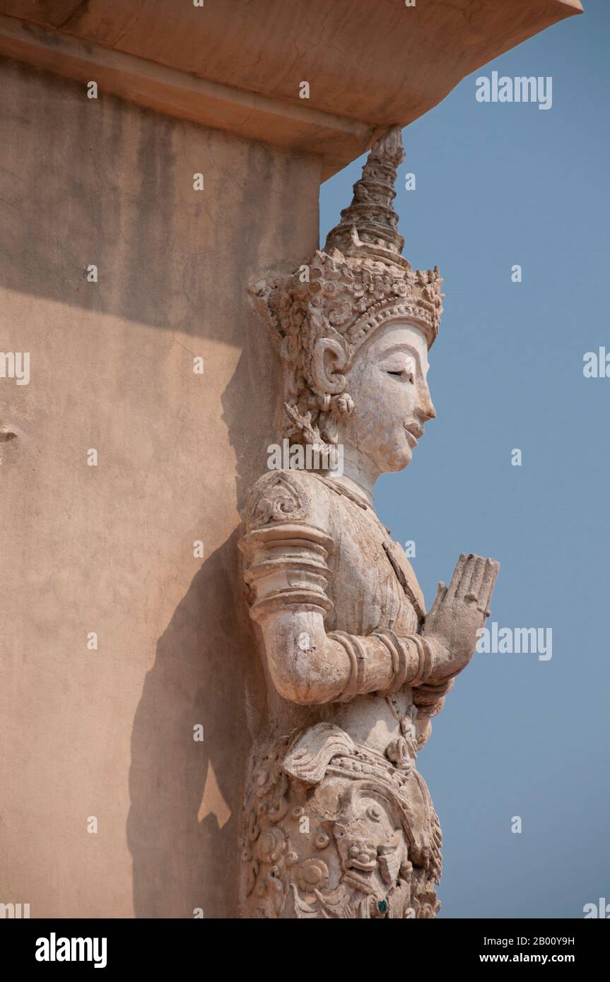 Thailand: Sculptures of thewada (angels) on the Ho Trai or library building, Wat Phra Singh, Chiang Mai, Northern Thailand. Wat Phra Singh or to give it its full name, Wat Phra Singh Woramahaviharn, was first constructed around 1345 by King Phayu, 5th king of the Mangrai Dynasty. King Mengrai founded the city of Chiang Mai (meaning "new city") in 1296, and it succeeded Chiang Rai as capital of the Lanna kingdom. Chiang Mai sometimes written as "Chiengmai" or "Chiangmai", is the largest and most culturally significant city in northern Thailand. Stock Photo