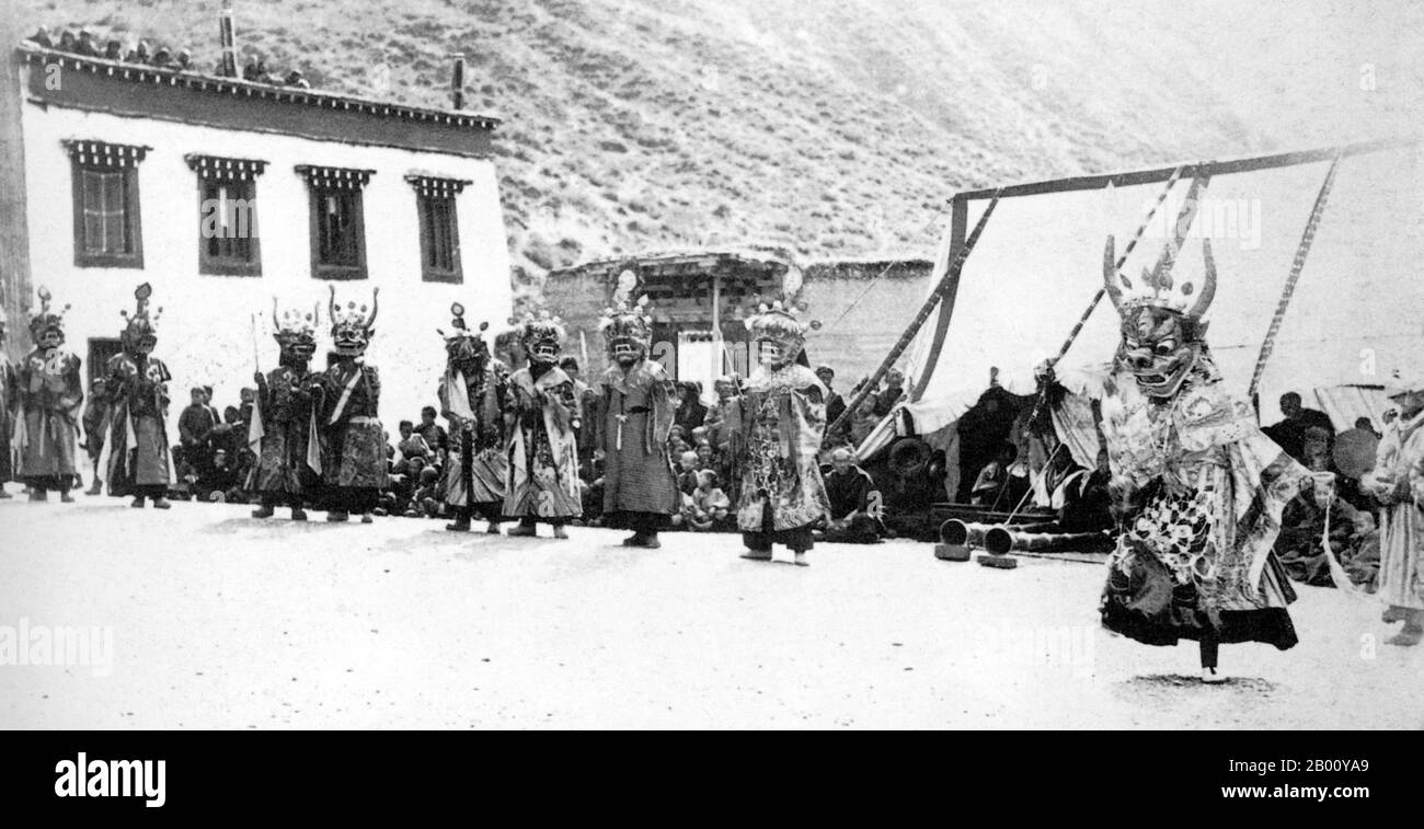 Tibet/China: A 1905 photograph of Lamaic dancing at a ceremony in a lamasery in Yerkalo in the Tibetan/Yunnanese border area.  Perhaps due to misunderstandings by early Western scholars attempting to understand Tibetan Buddhism, the term 'Lama' has historically been erroneously applied to Tibetan monks generally. Similarly, Tibetan Buddhism was referred to as 'Lamaism' by early Western academics and travelers who did not understand that what they were witnessing was a form of Buddhism; they may also have been unaware of the distinction between Tibetan Buddhism and Bon. Stock Photo
