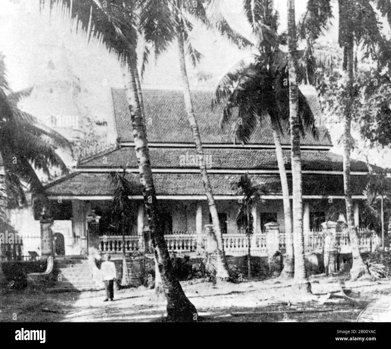 Cambodia: A 1918 photograph of the mosque of Chrang Chames, near Phnom Penh, with its minaret barely visible in the background.   In Cambodia, Islam is the religion of the majority of Cham people and some Malay minorities. In 1975, there were reportedly 150,000 to 200,000 Muslims nationwide. However, persecution under the Khmer Rouge severely eroded their numbers. In 2009, the Pew Research Center estimated the Muslim population of Cambodia at 236,000. All of the Cham Muslims are Sunnis of the Shafi'i school. There is also a growing Ahmadiyya  Muslim community in the country. Stock Photo
