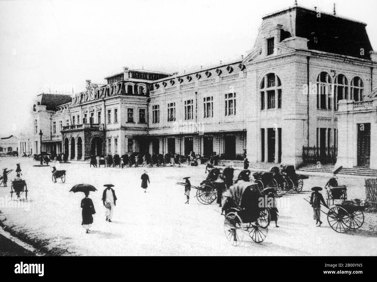 Vietnam: Hang Co Railway Station, Hanoi. Photo by Pierre Dieulefils (1862-1937), c. 1912.  The Vietnamese North-South Railway was constructed by French colonialists as part of a wider railway network in Indochina. On 2 October 1936, the Hanoi-Saigon Railway, a length of 1,726 km, on 1-meter gauge tracks, was officially inaugurated by French colonists. It runs to this day. Stock Photo