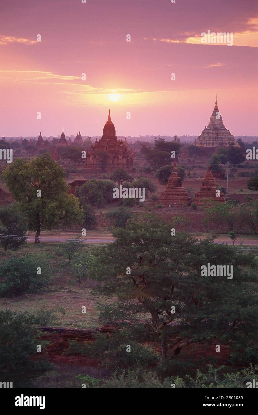 Burma: Dawn over Bagan (Pagan) Ancient City.  Bagan, formerly Pagan, was mainly built between the 11th century and 13th century. Formally titled Arimaddanapura or Arimaddana (the City of the Enemy Crusher) and also known as Tambadipa (the Land of Copper) or Tassadessa (the Parched Land), it was the capital of several ancient kingdoms in Burma. Stock Photo