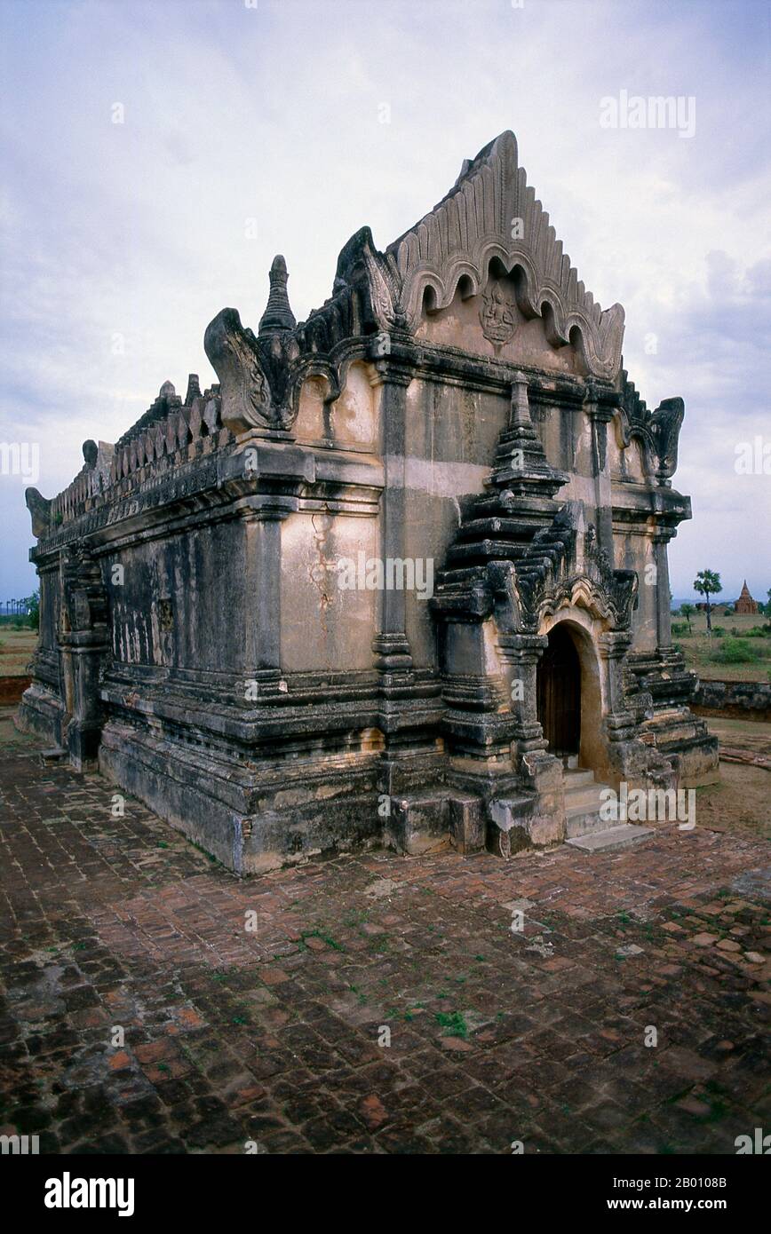 Burma: Upali Thein, Bagan (Pagan) Ancient City. Upali Thein is a Buddhist ordination hall situated between Bagan and Nyaung U in Myanmar. Built during the reign of King Anawrahta (1014-1077), its well-preserved interior frescoes were made in 1794-1795 during the Konbaung Dynasty. Bagan, formerly Pagan, was mainly built between the 11th century and 13th century. Formally titled Arimaddanapura or Arimaddana (the City of the Enemy Crusher) and also known as Tambadipa (the Land of Copper) or Tassadessa (the Parched Land), it was the capital of several ancient kingdoms in Burma. Stock Photo