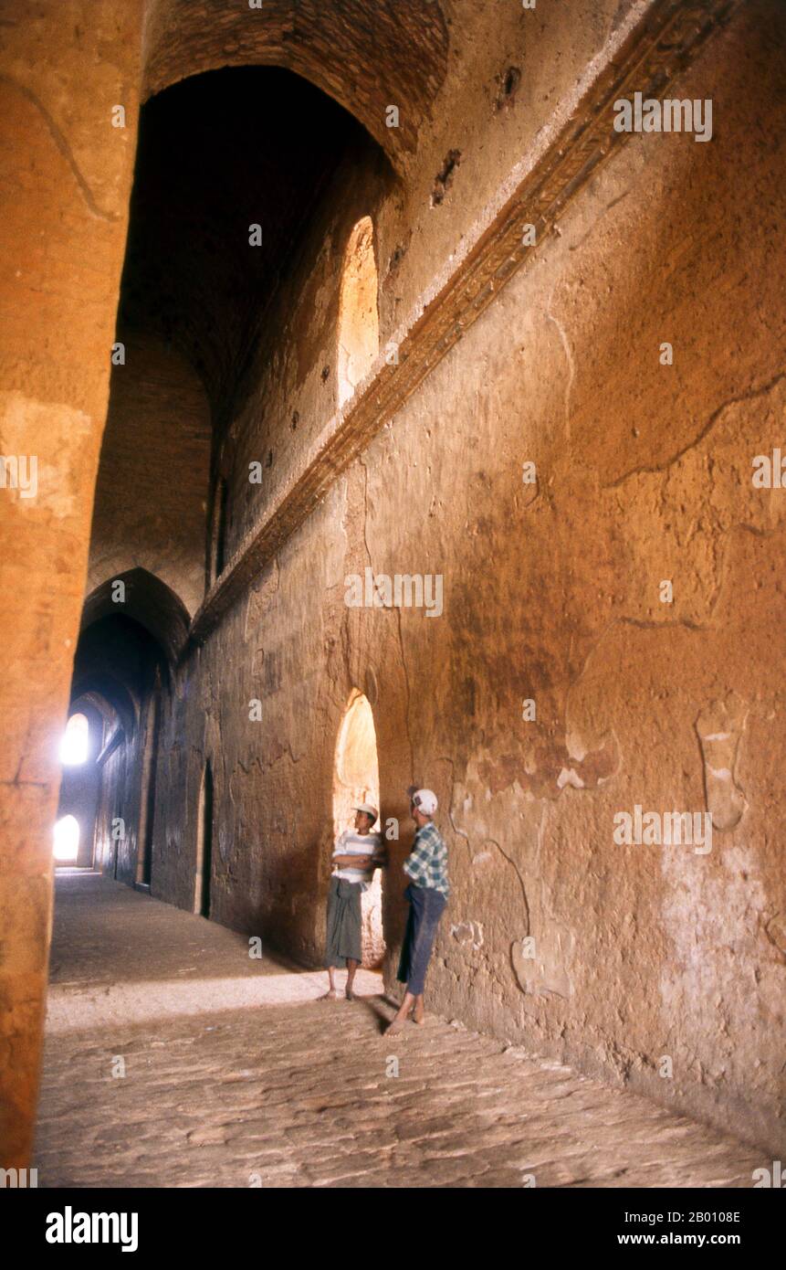 Burma: A cloister within the Dhammayangyi Temple, Bagan (Pagan) Ancient City. Dhammayangyi Temple is the largest temple in Bagan and was built during the reign of King Narathu (1167-1170). Bagan, formerly Pagan, was mainly built between the 11th century and 13th century. Formally titled Arimaddanapura or Arimaddana (the City of the Enemy Crusher) and also known as Tambadipa (the Land of Copper) or Tassadessa (the Parched Land), it was the capital of several ancient kingdoms in Burma. Stock Photo