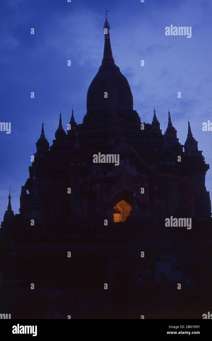 Burma: Htilominlo Temple, Bagan (Pagan) Ancient City. Htilominlo Temple was built during the reign of King Htilominlo (also known as Nandaungmya) in 1211. Bagan, formerly Pagan, was mainly built between the 11th century and 13th century. Formally titled Arimaddanapura or Arimaddana (the City of the Enemy Crusher) and also known as Tambadipa (the Land of Copper) or Tassadessa (the Parched Land), it was the capital of several ancient kingdoms in Burma. Stock Photo