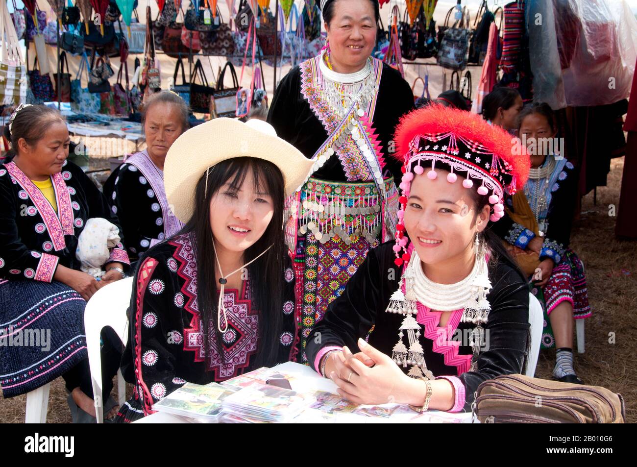 Thailand: CD vendors, Hmong New Year celebrations, Chiang Mai, Northern Thailand.  Hmong New Year generally takes place in either November or December (traditionally at the end of the harvest season).  The Hmong are an Asian ethnic group from the mountainous regions of China, Vietnam, Laos, and Thailand. Hmong are also one of the sub-groups of the Miao ethnicity in southern China. Hmong groups began a gradual southward migration in the 18th century due to political unrest and to find more arable land. Stock Photo