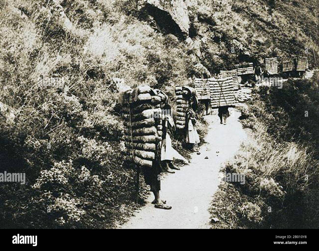 China: Tea Porters on Tea Horse Road, Western Sichuan. Photo by Auguste Francois (1857-1935), 1908. Stock Photo