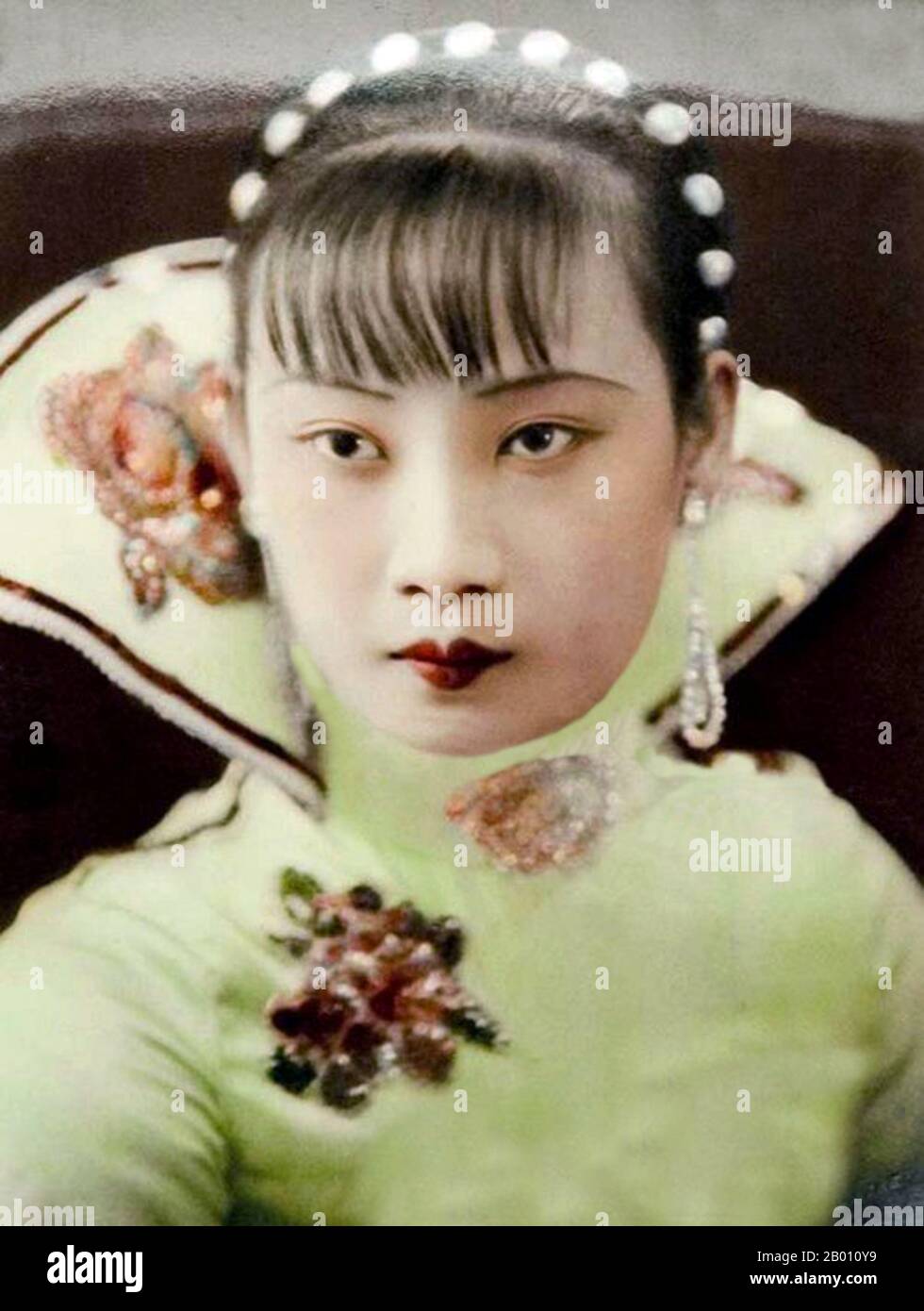 China: Shanghai actress Hu Die, also known as 'Butterfly Hu' (1907-1989), 1946.  Hu Die (1907-1989) had a career as a film actress from the late 1920s to the 1960s. She had her most brilliant period in the 1930s and the 1940s. Early in the 1930s, she played the leading role in China's first sound film, 'The Singsong Girl', in which she portrays a kindhearted but somewhat ignorant woman who endures her husband's mistreatment and oppression without the slightest resistance. Stock Photo