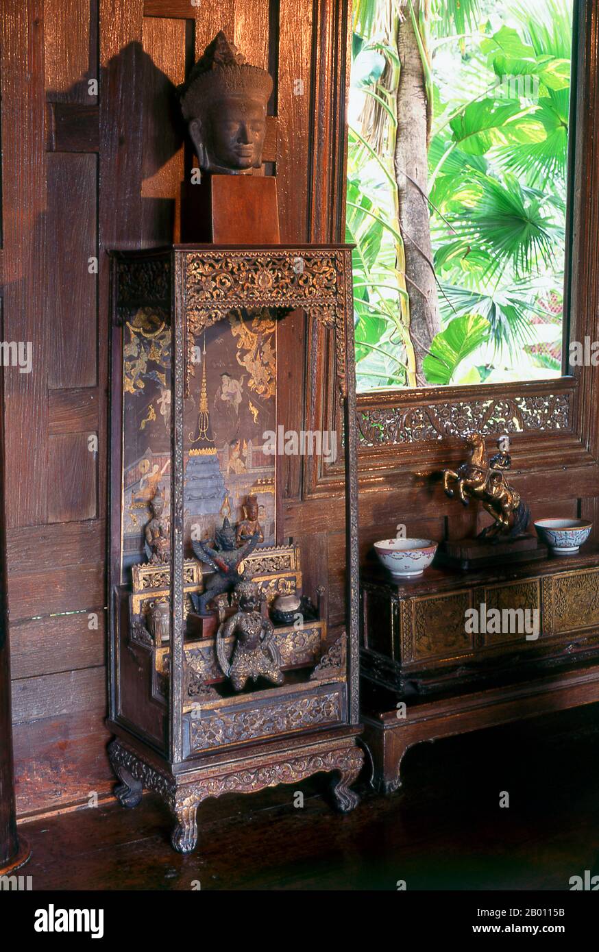 Thailand: Interior of drawing room, Jim Thompson House, Bangkok.  The Jim Thompson House is a museum in Bangkok. It is a complex of various old Thai structures that the American businessman Jim Thompson collected from all parts of Thailand in the 1950s and 60s.  James (Jim) Harrison Wilson Thompson (born March 21, 1906 in Greenville, Delaware - unknown) was an American businessman who helped revitalize the Thai silk industry in the 1950s and 1960s. A former U.S. military intelligence officer, Thompson mysteriously disappeared from Malaysia's Cameron Highlands while going for a walk in 1967. Stock Photo