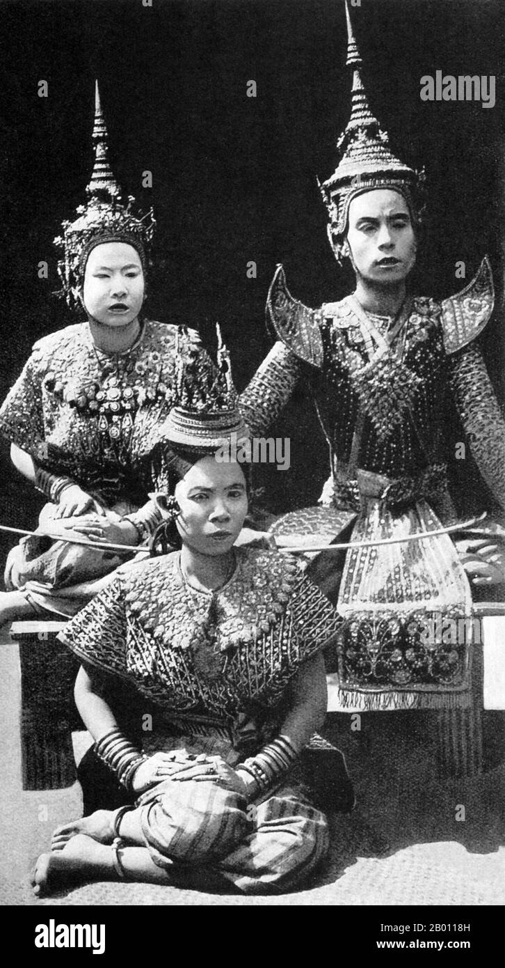 Thailand: Three professional theatre actors in Siam, c. 1900.  The Siamese were avid theatre-goers at the turn of the 20th century. Mime, dance, plays and shadow puppetry were all very popular. Many of the stage plays involved dancers, mostly female, who adorned themselves in jewellery and exhibited lithe movements portraying beauty and flexibility, especially in bending the fingers back. The most common plays were called ‘khon’, which essentially feature scenes from the ‘Ramakien’, the Thai version of the Hindu epic ‘The Ramayana’. Stock Photo