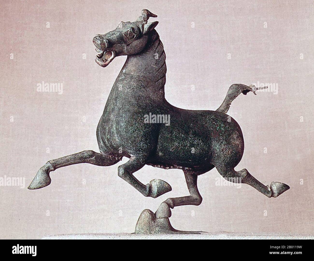 China: The Flying Horse of Gansu, 2nd century CE.  The Flying Horse of Gansu, also known as the Bronze Running Horse or the Galloping Horse Treading on a Flying Swallow, is a bronze sculpture from the tomb of General Zhang, Leitai, Wuwei County, Gansu province, 2nd century CE, Eastern Han Dynasty. Stock Photo