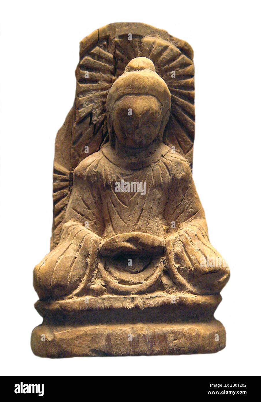 China: A 5th century Serindian Buddha image from Tumshuq (also Tumxuk, Tumushuke) in Western Xinjiang.  Serindian art developed from the 2nd through the 11th century C.E. in Serindia or Xinjiang, the western region of China that forms part of Central Asia. It derives from the art of the Gandhara district of what is now Afghanistan and Pakistan. Gandharan sculpture combined Indian traditions with Greek influences. Greek-influenced culture may have existed in the region before Alexander the Great's invasions, but the empires founded by him and his successors were a major syncretic cultural force Stock Photo
