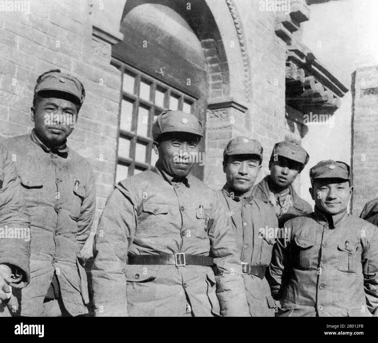 China: Zhu De (1 December 1886 – 6 July 1976) at Yan'an, c. 1937. To the right is a young Deng Xiaoping.  Zhu De was a Chinese Communist military leader and statesman. He is regarded as the founder of the Chinese Red Army (the forerunner of the People's Liberation Army) and the tactician who engineered the victory of the People's Republic of China during the Chinese Civil War. Stock Photo