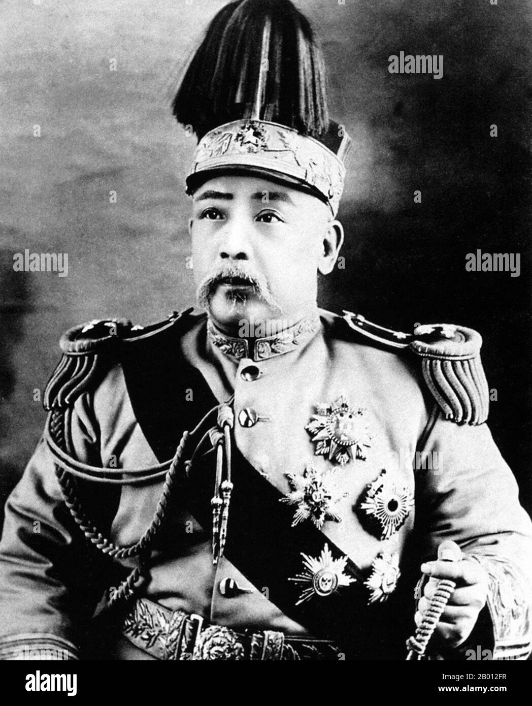 China: Yuan Shikai (Yuan Shih-k'ai, 1859–1916), First President of the Republic of China (1912-1915), 'Emperor of China' (1915-1916), 1915.  Yuan Shikai (Yuan Shih-k'ai, 16 September 1859–6 June 1916) was an important Chinese general and politician famous for his influence during the late Qing Dynasty, his role in the events leading up to the abdication of the last Qing Emperor of China, his autocratic rule as the first President of the Republic of China, and his short-lived attempt to revive the Chinese monarchy, with himself as the 'Great Emperor of China'. Stock Photo