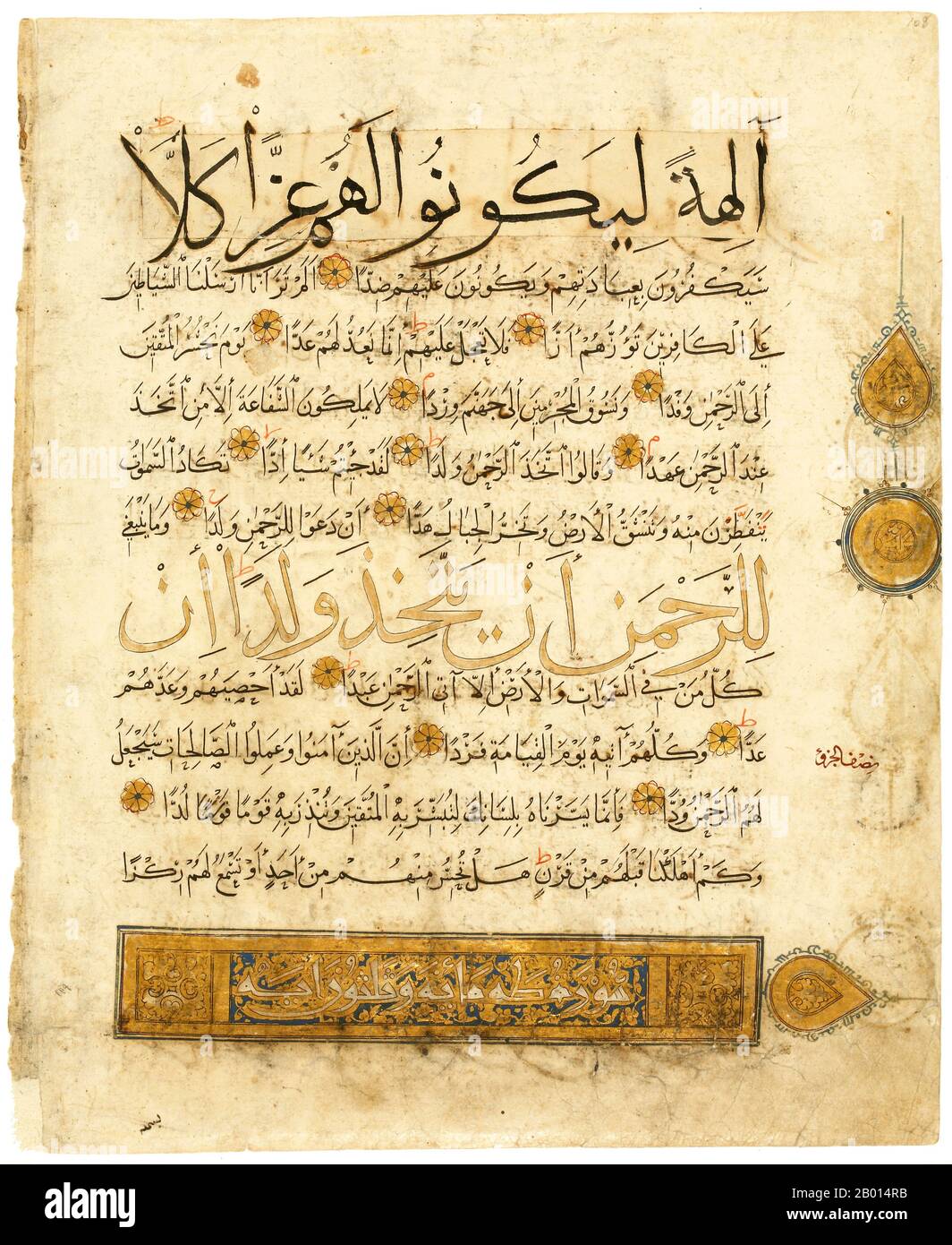 Yemen: Leaf from a Qur'an featuring four types of script, 14th century.  Unusually, this leaf from a Qur'an exhibits four different types of script. Eastern Kufi is used for the framed, illuminated chapter heading for sura 20 and the round markers for each tenth verse. In additioni Naskh is used for the main text; Muhaqqaq is used in the black lines contoured with gold; and Thuluth is used for the golden centre lines. Stock Photo