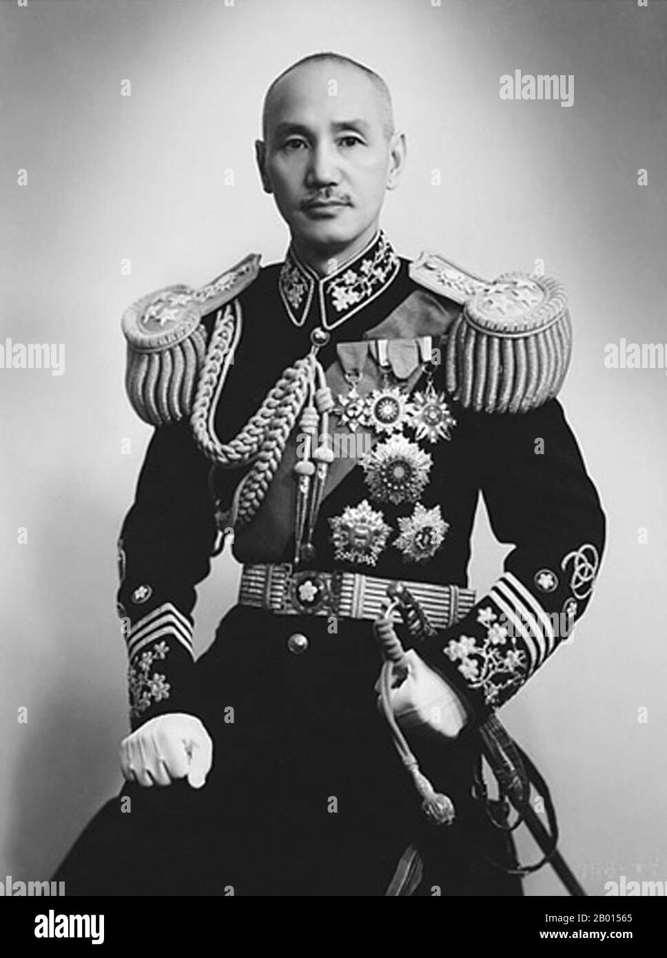 China: General Chiang Kai-shek (October 31, 1887 – April 5, 1975), leader of the Kuomintang, 1943.  Chiang Kai-shek was a political and military leader of 20th century China. He is known as Jiǎng Jièshí or Jiǎng Zhōngzhèng in Mandarin. Chiang was an influential member of the Nationalist Party, the Kuomintang (KMT), and was a close ally of Sun Yat-sen. He became the Commandant of the Kuomintang's Whampoa Military Academy, and took Sun's place as leader of the KMT when Sun died in 1925. In 1926, Chiang led the Northern Expedition to unify the country, becoming China's nominal leader. Stock Photo