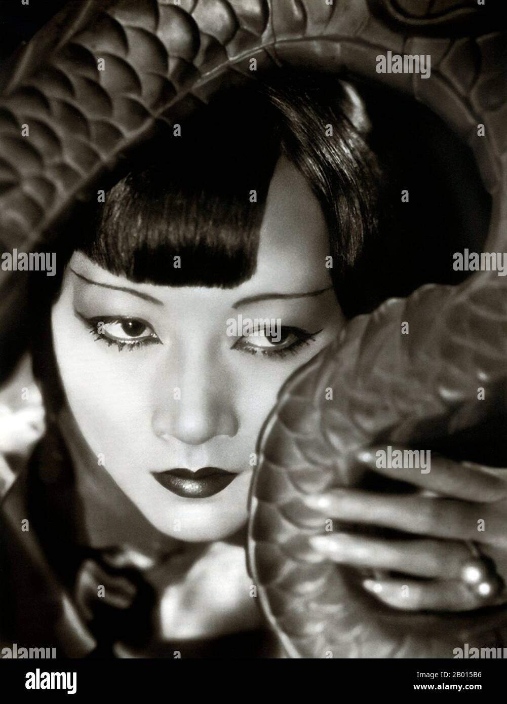 USA: Anna May Wong, Chinese-American movie star (3 January 1905 – 3 February 1961), c. 1931.  Anna May Wong was an American actress, the first Chinese American movie star, and the first Asian American to become an international star. Her long and varied career spanned both silent and sound film, television, stage, and radio.  Born near the Chinatown neighborhood of Los Angeles to second-generation Chinese-American parents, Wong became infatuated with the movies and began acting in films at an early age. Stock Photo
