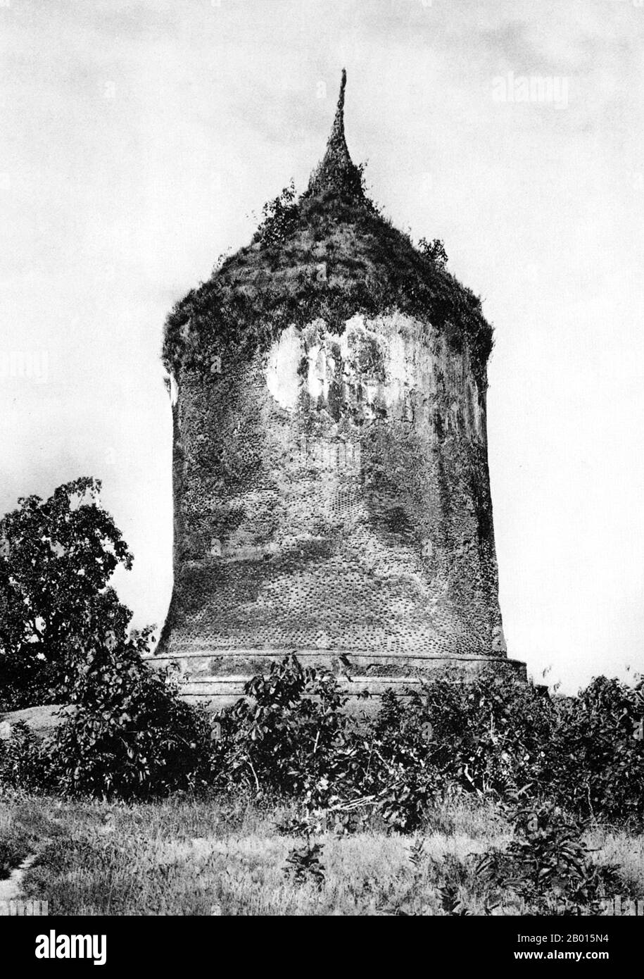 Burma/Myanmar: Bobogi Pagoda, near Prome, lower Burma, c. 1920s.  Legend attributes the first Buddhist doctrine in Burma to 228 BCE when Sohn Uttar Sthavira, one of the royal monks to Emperor Ashoka the Great of India, came to the country with other monks and sacred texts. However, the era of Buddhism truly began in the 11th century after King Anawrahta of Pagan (Bagan) was converted to Theravada Buddhism. Today, 89% of the population of Burma is Theravada Buddhist.  Prome, renamed Pyay, is a town in Pegu (Bago) Division in lower Burma, located on the Irrawaddy (Ayeyarwady) River. Stock Photo