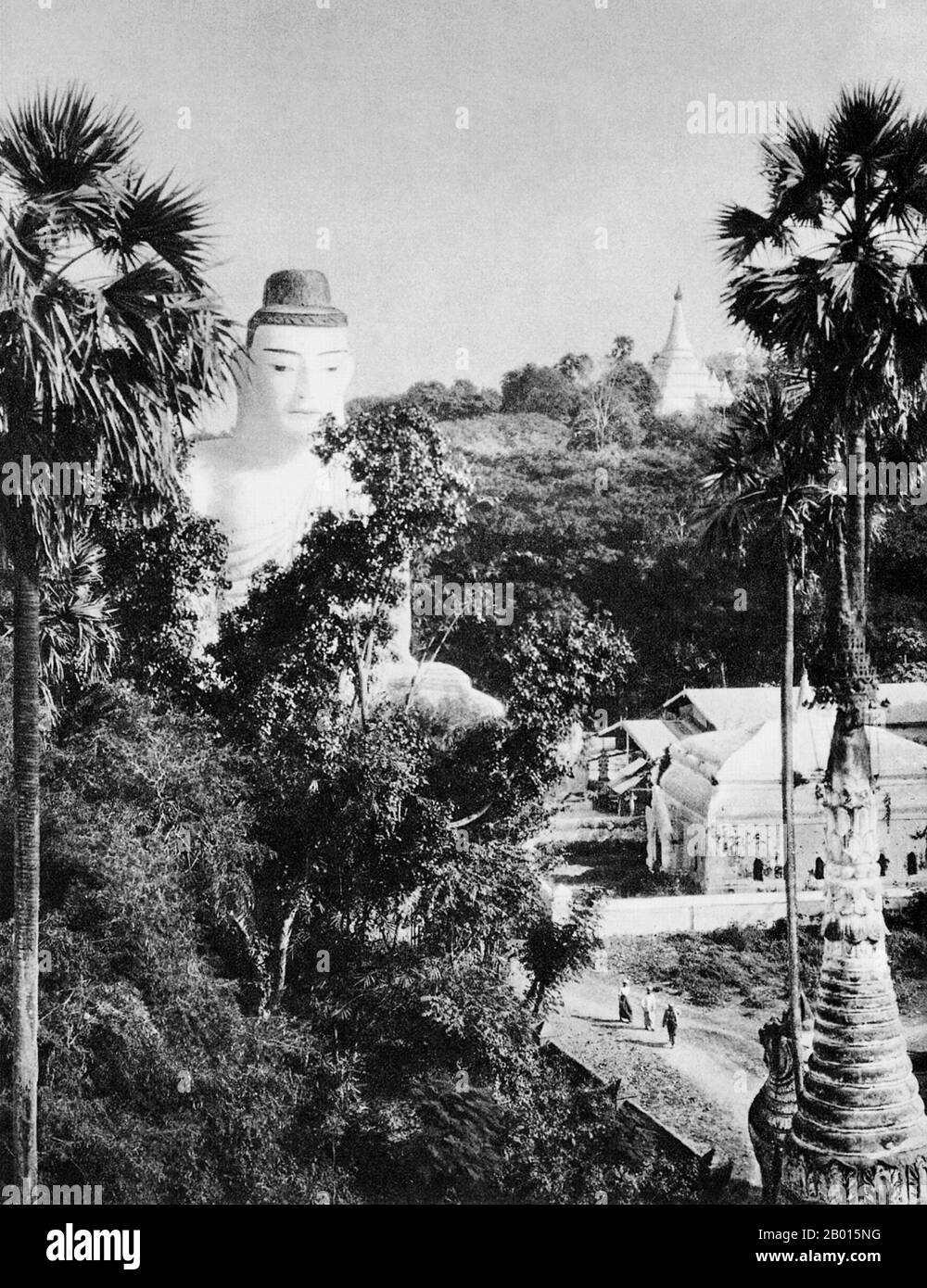 Burma/Myanmar: A Buddha statue in Prome, lower Burma, c. 1920s.  Legend attributes the first Buddhist doctrine in Burma to 228 BCE when Sohn Uttar Sthavira, one of the royal monks to Emperor Ashoka the Great of India, came to the country with other monks and sacred texts. However, the era of Buddhism truly began in the 11th century after King Anawrahta of Pagan (Bagan) was converted to Theravada Buddhism. Today, 89% of the population of Burma is Theravada Buddhist.  Prome, renamed Pyay, is a town in Pegu (Bago) Division in lower Burma, located on the Irrawaddy (Ayeyarwady) River. Stock Photo