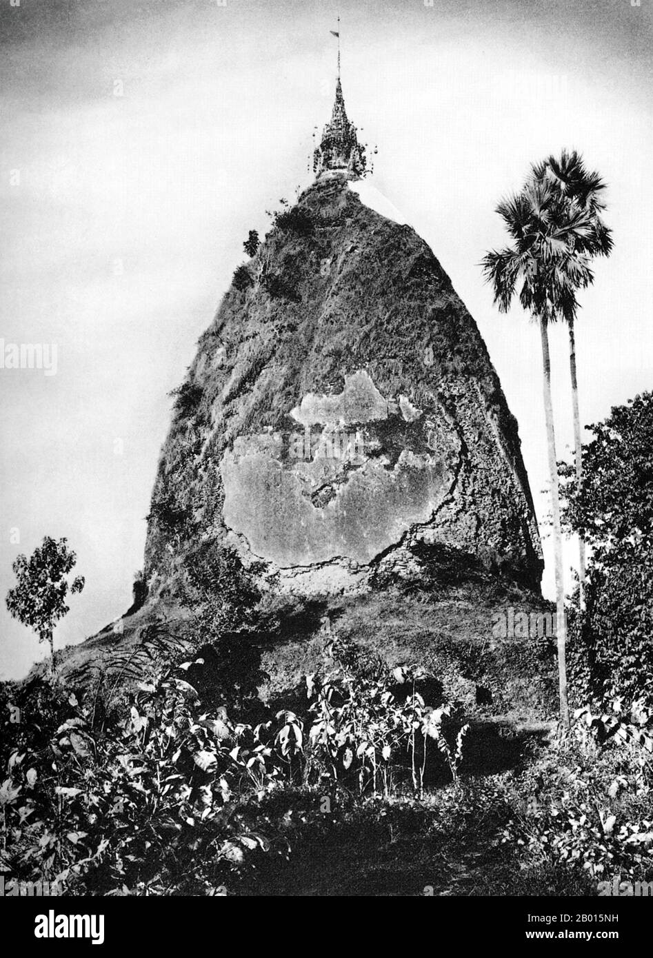 Burma/Myanmar: Papagyi Pagoda near Prome, lower Burma, c. 1920s.  Legend attributes the first Buddhist doctrine in Burma to 228 BCE when Sohn Uttar Sthavira, one of the royal monks to Emperor Ashoka the Great of India, came to the country with other monks and sacred texts. However, the era of Buddhism truly began in the 11th century after King Anawrahta of Pagan (Bagan) was converted to Theravada Buddhism. Today, 89% of the population of Burma is Theravada Buddhist.  The ancient city of Prome, renamed Pyay, is a town in Pegu (Bago) Division in lower Burma, located on the Irrawaddy (Ayeyarwady) Stock Photo