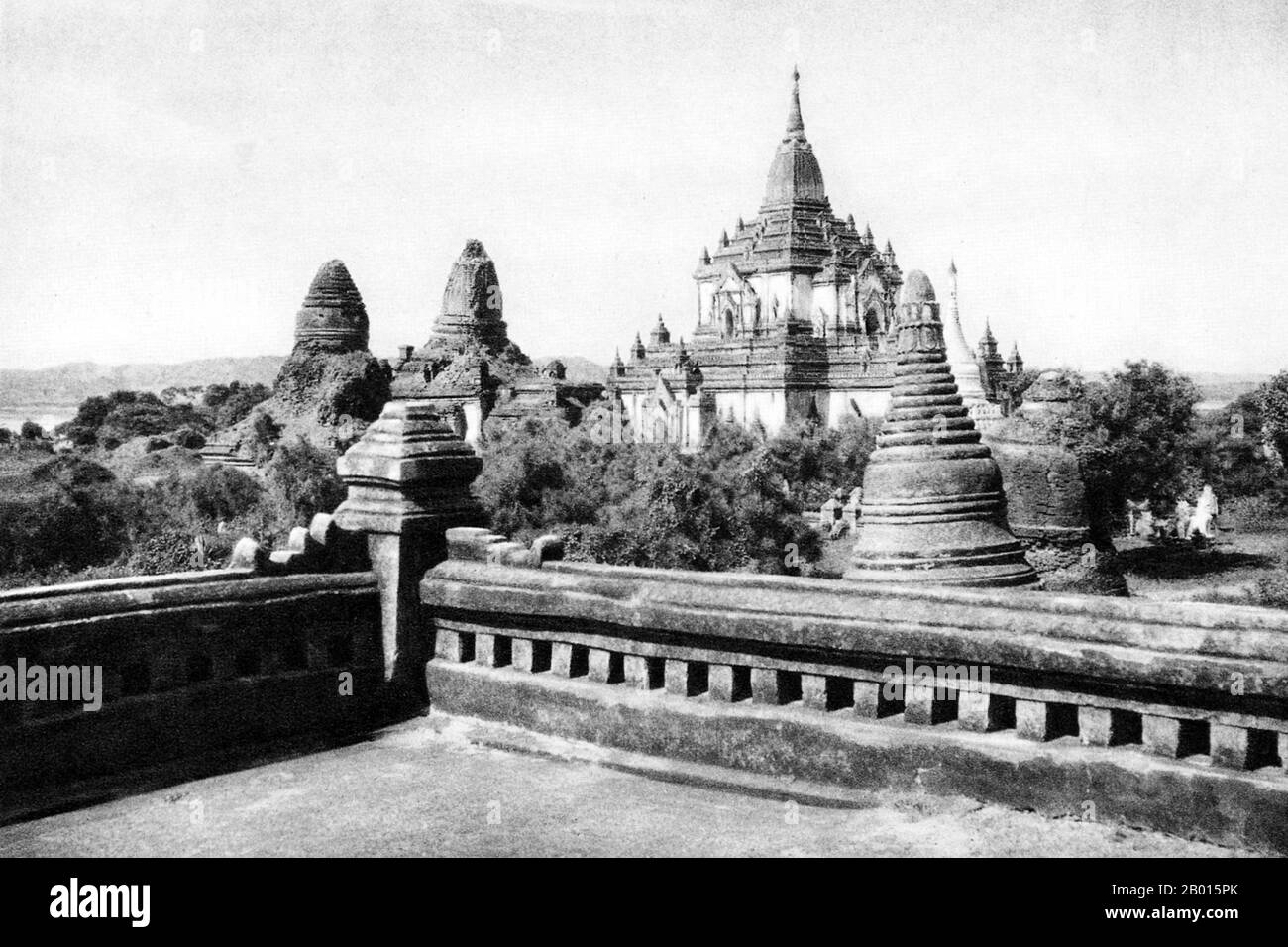 Burma/Myanmar: Gawdawpalin Pagoda in Bagan, Upper Burma, c. 1920s.  Construction of the Gawdawpalin Pagoda began during the reign of King Narapatisithu (1173–1210) and was completed during the reign of Htilominlo (1210-34). Gawdawpalin Temple is the second tallest temple in Bagan and is similar in layout to Thatbyinnyu Temple. Gawdawpalin Temple is two storeys tall, and contains three lower terraces and four upper terraces. The temple was heavily damaged during an earthquake in 1975 and was reconstructed in following years. Stock Photo