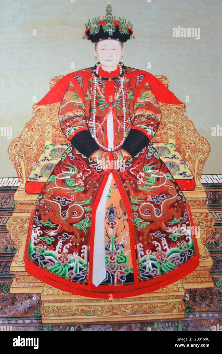 China: Empress Xiao Hui Zhang (5 November 1641 - 7 January 1718) second consort of the Shunzhi Emperor. Hanging scroll painting, late 17th century.  Empress Xiaohuizhang, born Alatan Qiqige, was originally of the Khorchin Mongol Borjigit clan. When Shunzhi's first Empress was demoted in 1653, Xiaohuizhang she was promoted to Consort. One year later she officially became Shunzhi's second Empress. When the Kangxi Emperor ascended the throne, she was honoured as Dowager Empress Renxian, although she was not the biological mother of the new emperor. Stock Photo