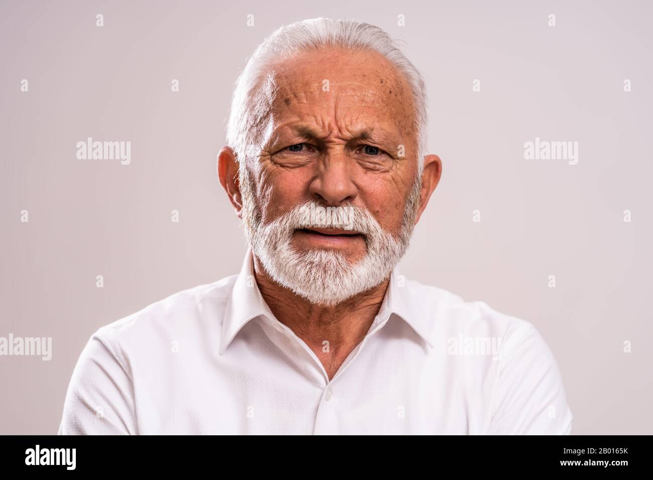 Portrait of senior man who is worried and disappointed. Stock Photo
