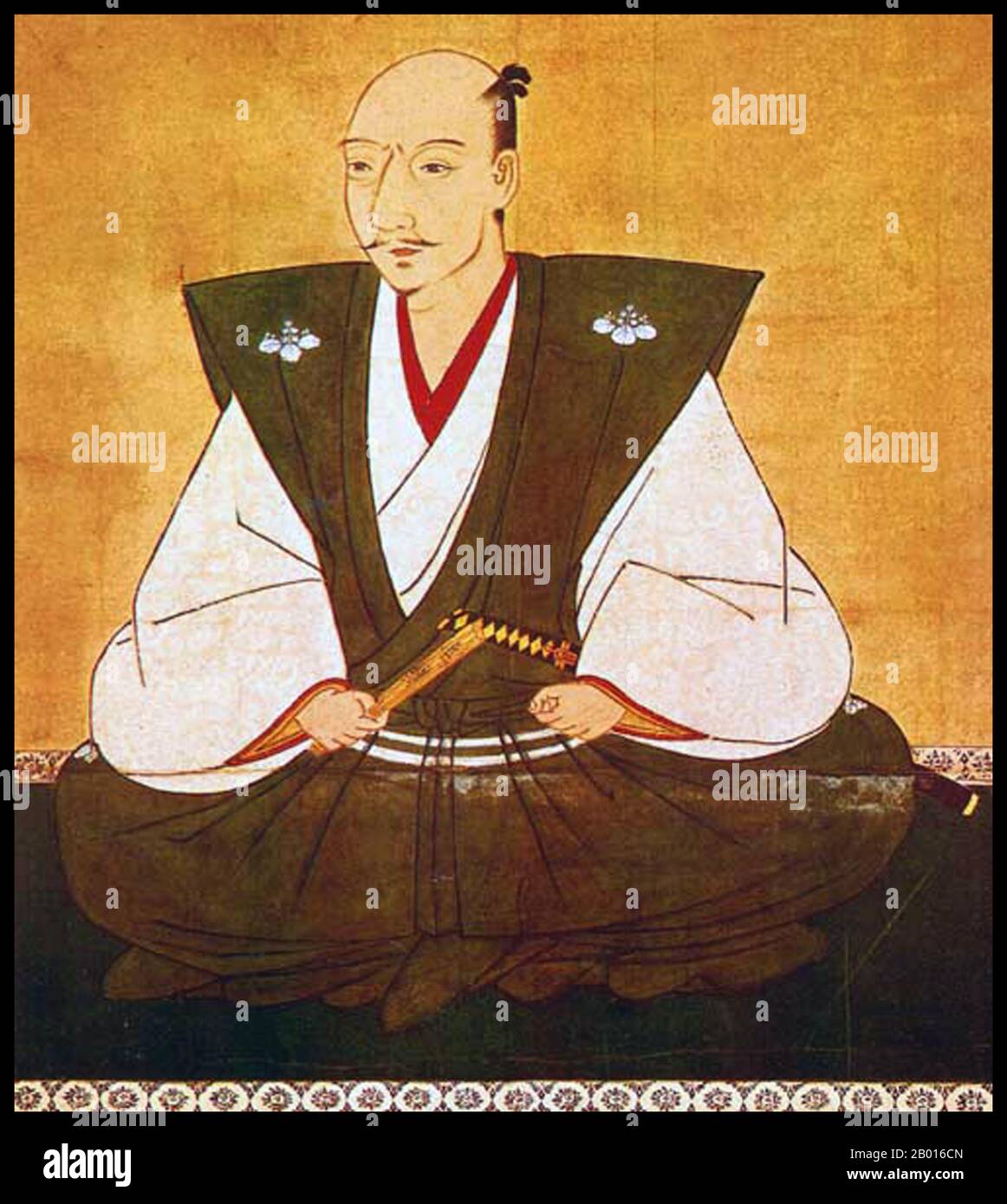 Japan: Oda Nobunaga (23 June 1534 - 21 June 1582), initiator of the unification of Japan in the 16th century. Hanging scroll painting by Munehide Kano (1551-1601), 1583.  Oda Nobunaga was the initiator of the unification of Japan under the rule of the shogun in the late 16th century. He was also a major daimyo during the Sengoku period of Japanese history. He was the second son of Oda Nobuhide, a deputy shugo (military governor) with land holdings in Owari Province.  Nobunaga lived a life of continuous military conquest, eventually conquering a third of Japanese daimyo before his death in 1582 Stock Photo