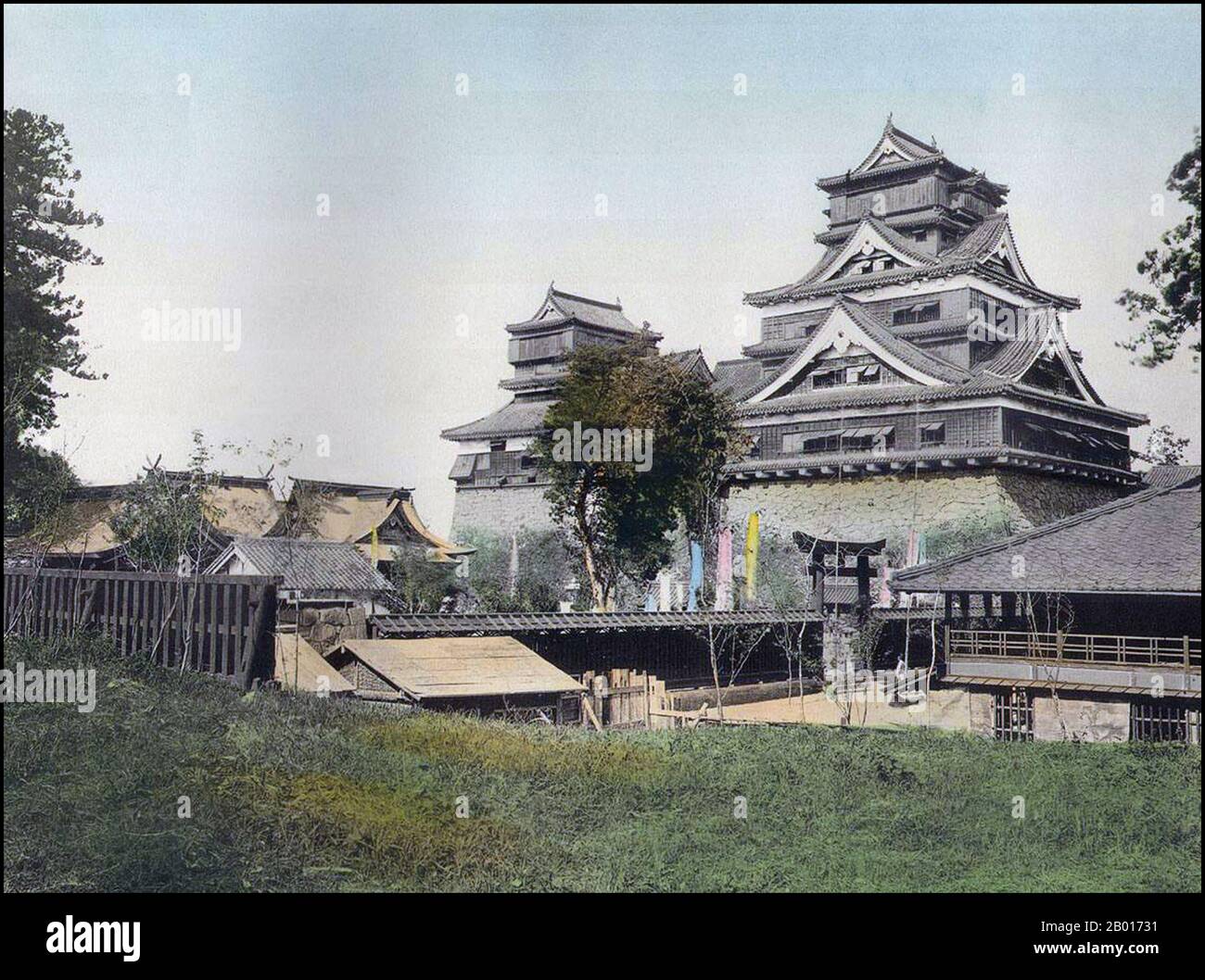 Japan: The Castle, Kumamoto, c. 1895.  Kumamoto is the capital city of Kumamoto Prefecture on the island of Kyūshū, Japan. Kato Kiyomasa, a contemporary of Toyotomi Hideyoshi, was made daimyo of half of the (old) administrative region of Higo in 1588. After that, Kiyomasa built Kumamoto Castle. Due to its many innovative defensive designs, Kumamoto Castle was considered impregnable, and Kiyomasa enjoyed a reputation as one of the finest castle-builders in Japanese history. Today the donjon (central keep) is a concrete reconstruction built in the 1970s. Stock Photo