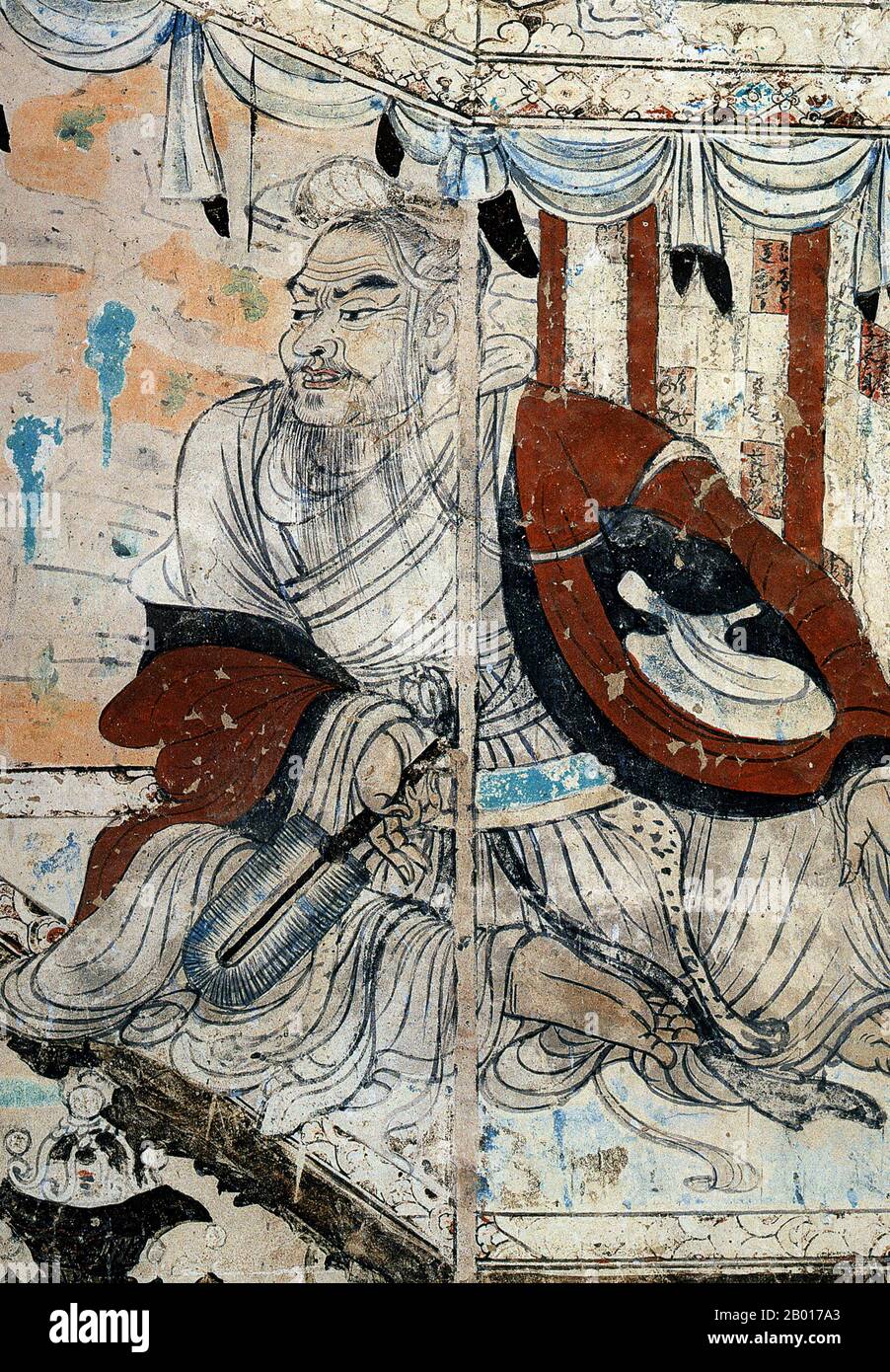 China: Vimalakirti in debate with the bodhisattva Manjusri. Detail from a wall painting in Mogao Cave 103, Dunhuang, 8th century.  The Vimalakīrti Sūtra is a Mahāyāna Buddhist sūtra. Among other subjects, the sutra teaches the meaning of nonduality. An important aspect of this scripture is that it contains a report of a teaching addressed to both arhats and bodhisattvas by the layman Vimalakīrti, who expounds the doctrine of Śūnyatā, or emptiness, to them. This culminates with the wordless teaching of silence. Stock Photo