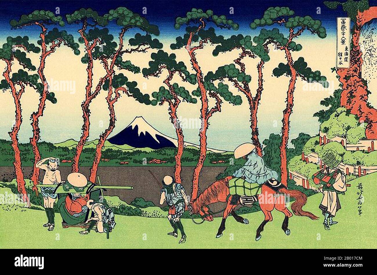 Japan: ‘Hodogaya on the Tokaido Road’. Ukiyo-e woodblock print from the series ‘Thirty-Six Views of Mount Fuji’ by Katsushika Hokusai (31 October 1760 - 10 May 1849), 1830.  ‘Thirty-six Views of Mount Fuji’ is an ‘ukiyo-e’ series of woodcut prints by Japanese artist Katsushika Hokusai. The series depicts Mount Fuji in differing seasons and weather conditions from a variety of places and distances. It actually consists of 46 prints created between 1826 and 1833. The first 36 were included in the original publication and, due to their popularity, 10 more were added after the original publication Stock Photo