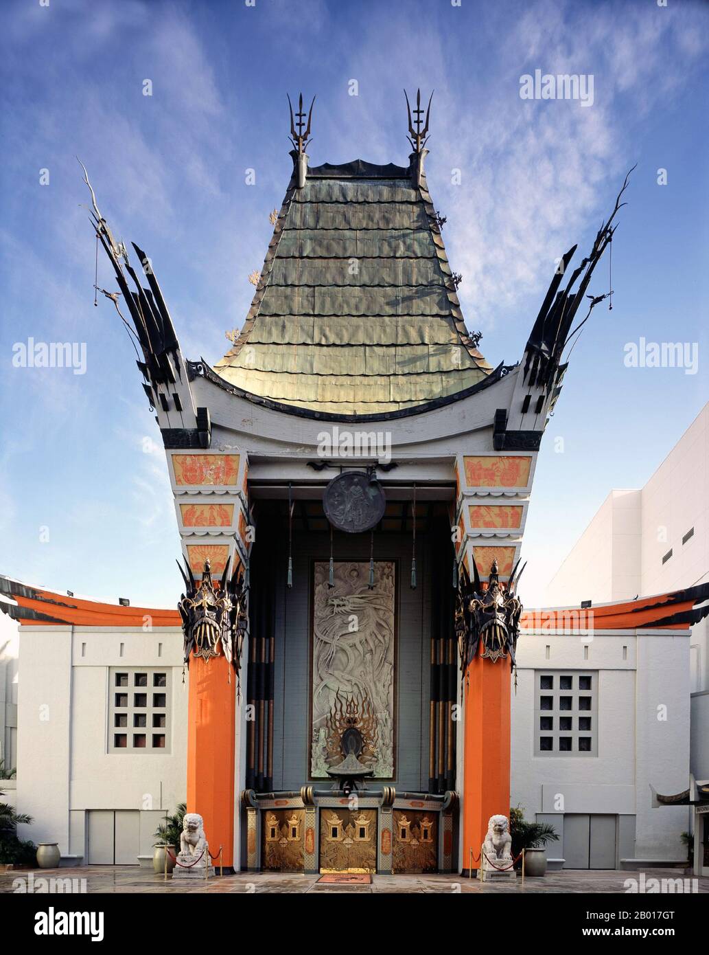 USA: Grauman's Chinese Theatre, Hollywood, California (opened 1927). Photo by Carl M. Highsmith (18 May 1946-), 7 April 2005 (Public Domain).  Grauman's Chinese Theatre is a movie theatre located at 6925 Hollywood Boulevard in Hollywood. It is located along the historic Hollywood Walk of Fame. The Chinese Theatre was commissioned following the success of the nearby Grauman's Egyptian Theatre which opened in 1922. Built over 18 months, beginning in January 1926 by a partnership headed by Sid Grauman, the theater opened May 18, 1927. Stock Photo