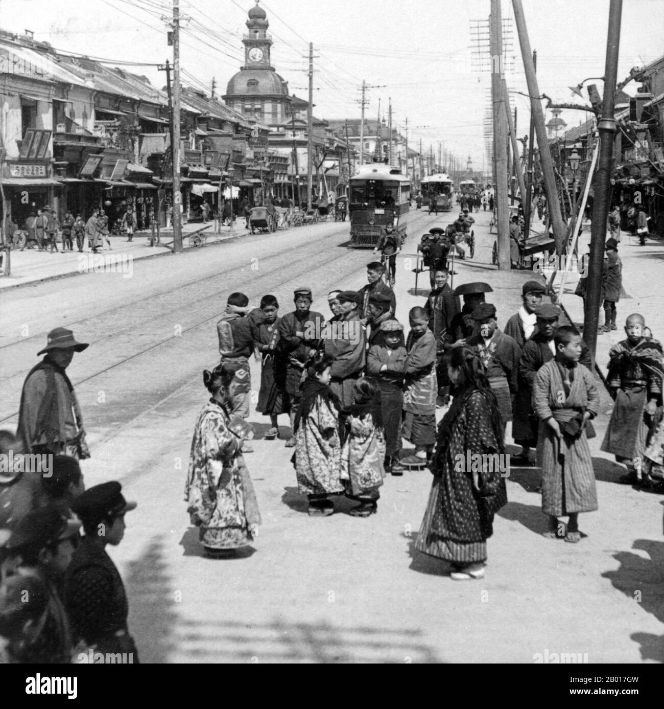Japan: A street scene in Tokyo's Ginza District, 1904.  Ginza is a district of Chūō, Tokyo, located south of Yaesu and Kyōbashi, west of Tsukiji, east of Yūrakuchō and Uchisaiwaichō, and north of Shinbashi. Stock Photo