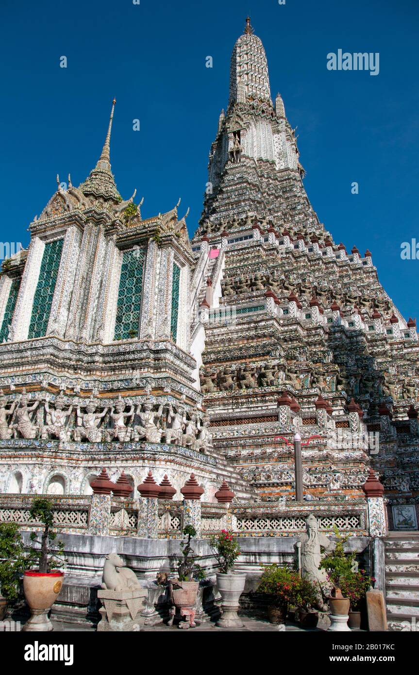 Thailand: The Khmer-style central prang at Wat Arun (Temple of Dawn), Bangkok.  Wat Arun Rajwararam (Temple of the Dawn), full name Wat Arunratchawararam Ratchaworamahawihan, is a Thai Buddhist temple on the Thonburi west bank side of the Chao Phraya River in Bangkok. It is named after Aruna, the Indian God of Dawn. A monastery has stood here since the Ayutthayan period (1351 - 1767), but the temple's outstanding feature, the Khmer-style central prang, was not begun until 1809, during the reign of King Buddha Loetla Nabhalai (Rama II). Stock Photo