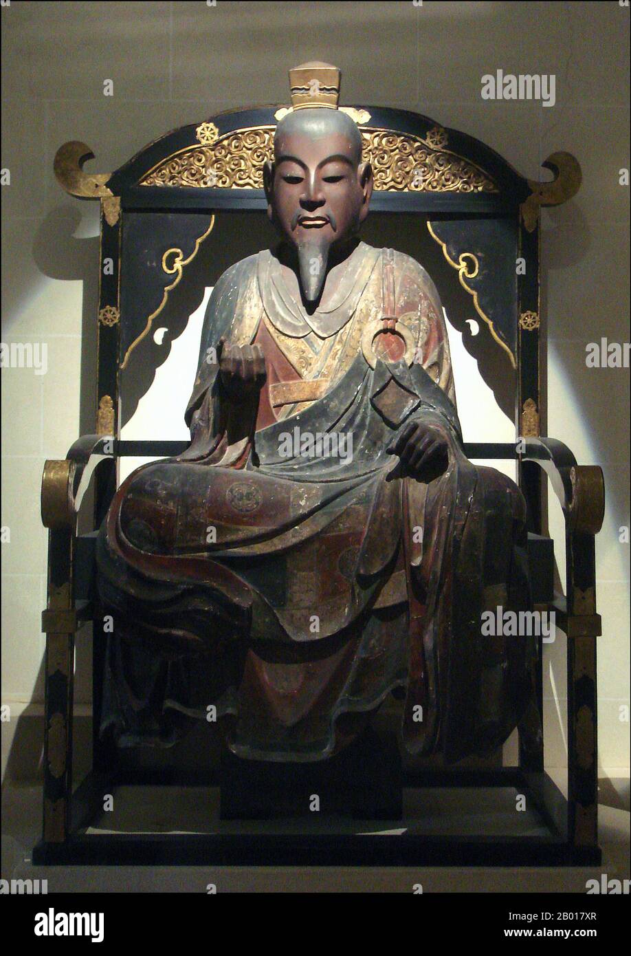Japan: Prince Shotoku (7 February 574 - 8 April 622). Statue in the Musee Guimet, photo by PHGCOM (CC BY-SA 3.0 License).  Prince Shotoku, also known as Prince Umayado, was a regent and a politician of the Asuka period in Japan. The son of Emperor Yomei, he was a member of the ruling Soga clan. Shotoku was appointed as regent (Sessho) in 593 by Empress Suiko, his aunt.  Shotoku, inspired by Buddhist teachings, succeeded in establishing a centralised government during his reign. In 603, he established the 12 official court ranks, and was a massive promoter of Buddhism throughout the nation. Stock Photo