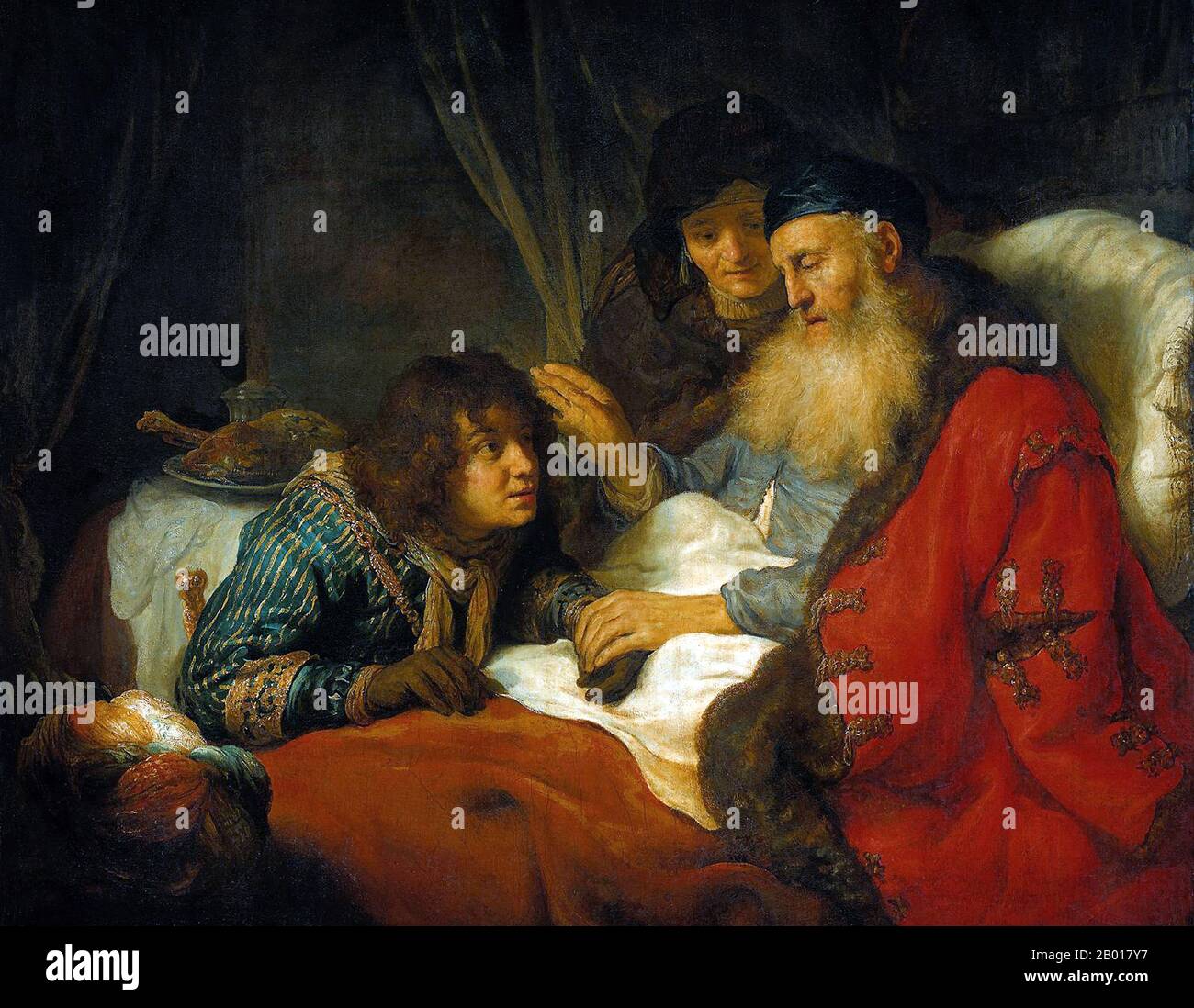 Netherlands: ‘Isaac Blessing Jacob’. Oil on canvas painting by Govert Flinck (25 January 1615 - 2 February 1660), 1638.  In a famous scene from the Hebrew Bible, or Christian Old Testament, Isaac, the only son of Abraham and Sarah, blesses his younger son Jacob from his deathbed.  Now Isaac is old and blind, and thinks he is blessing his elder son, Esau. Jacob has covered his hands in goatskin in imitation of his hirsute brother Esau to trick his father. Jacob’s mother, Rebecca, looks on anxiously. She is an accomplice to Jacob’s scheme. Stock Photo