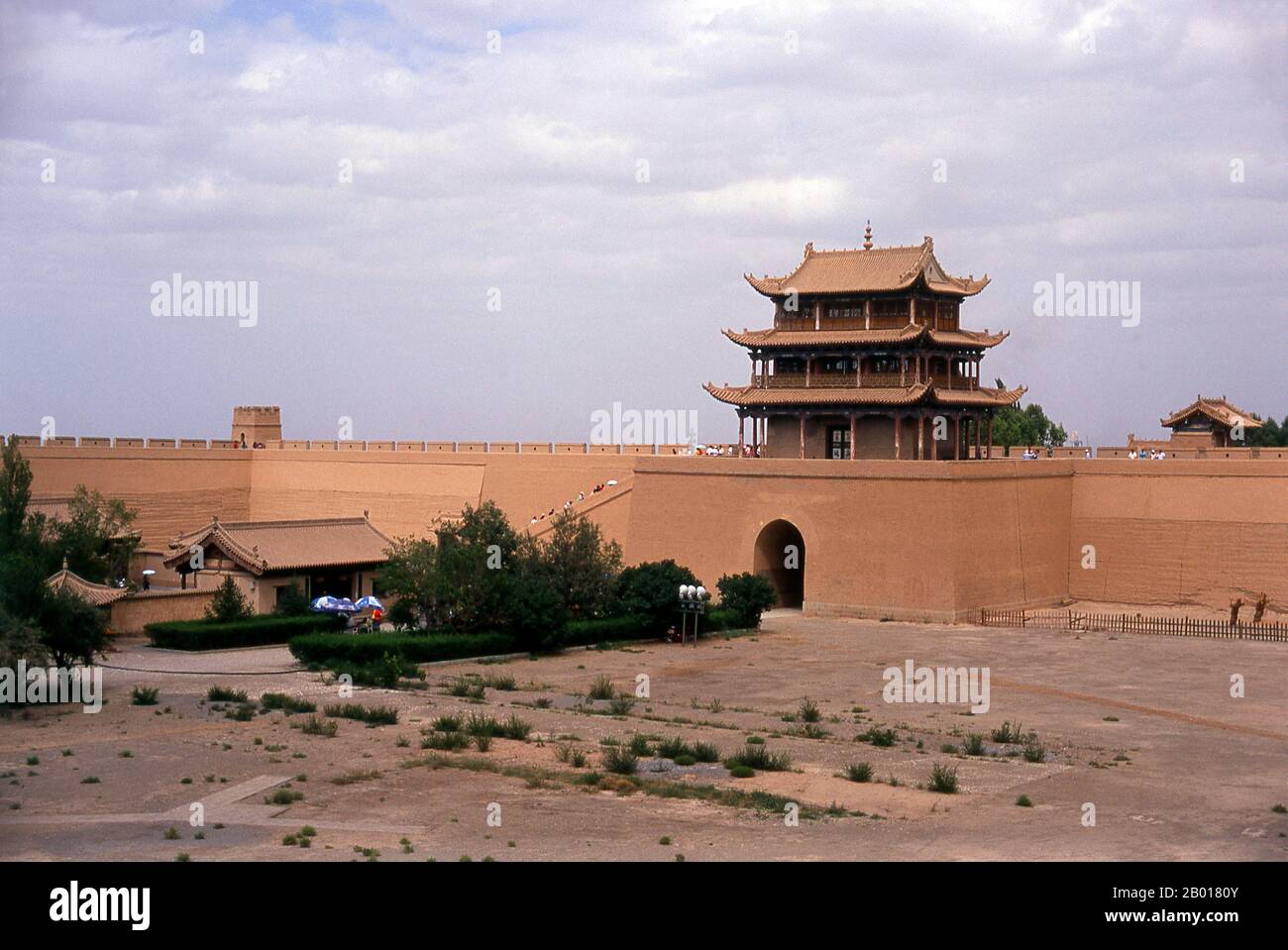 China: Jiayuguan Men (Gate of Sighs), Jiayuguan Fort, Jiayuguan, Gansu.  Jiayuguan, the ‘First and Greatest Pass under Heaven’, was completed in 1372 on the orders of Zhu Yuanzhang, the first Ming Emperor (1368-98), to mark the end of the Ming Great Wall. It was also the very limits of Chinese civilisation, and the beginnings of the outer ‘barbarian’ lands.  For centuries the fort was not just of strategic importance to Han Chinese, but of cultural significance as well. This was the last civilised place before the outer darkness, those proceeding beyond facing a life of exile among nomads. Stock Photo