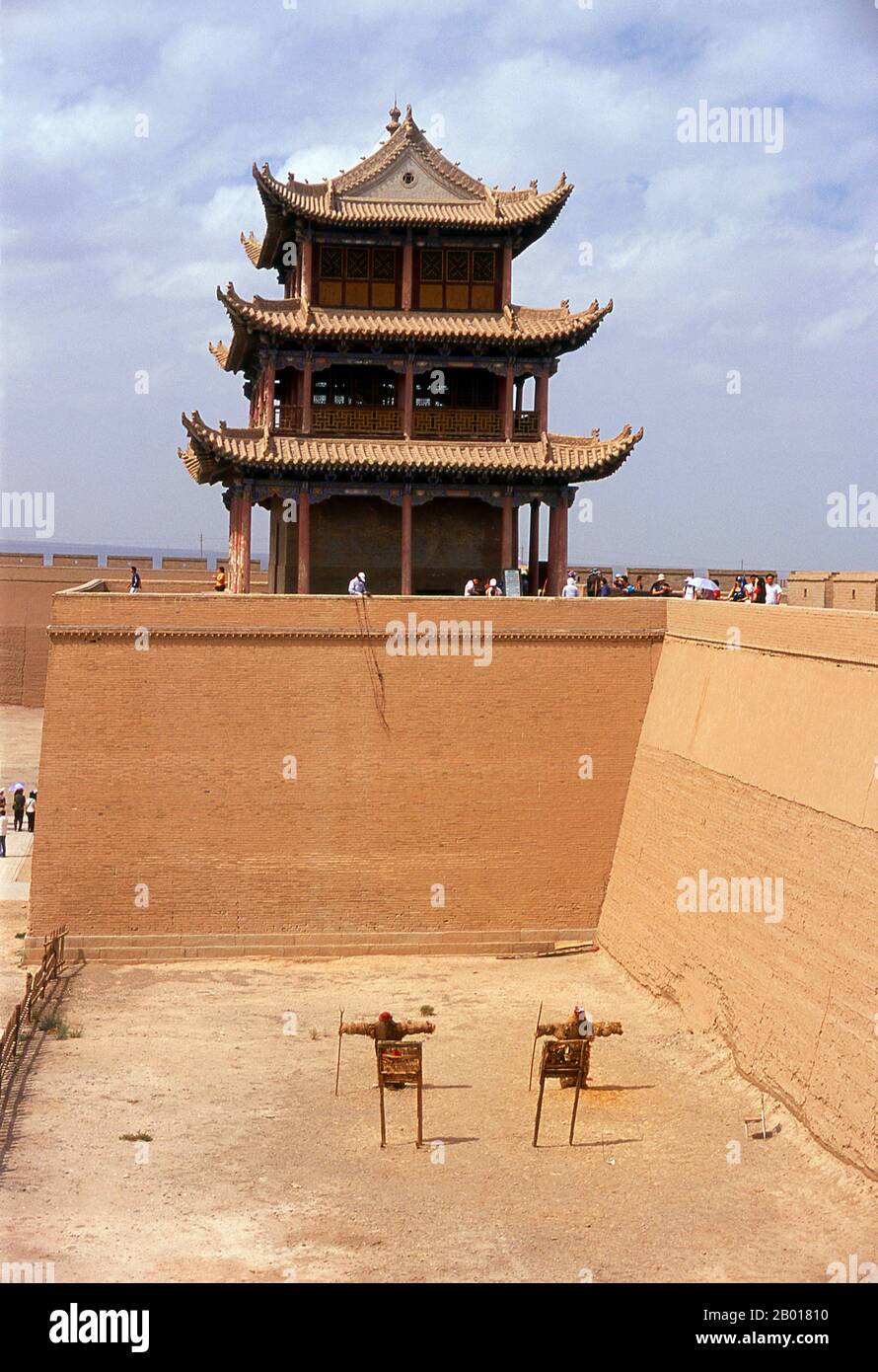 China: Jiayuguan Men (Gate of Sighs), Jiayuguan Fort, Jiayuguan, Gansu.  Jiayuguan, the ‘First and Greatest Pass under Heaven’, was completed in 1372 on the orders of Zhu Yuanzhang, the first Ming Emperor (1368-98), to mark the end of the Ming Great Wall. It was also the very limits of Chinese civilisation, and the beginnings of the outer ‘barbarian’ lands.  For centuries the fort was not just of strategic importance to Han Chinese, but of cultural significance as well. This was the last civilised place before the outer darkness, those proceeding beyond facing a life of exile among nomads. Stock Photo