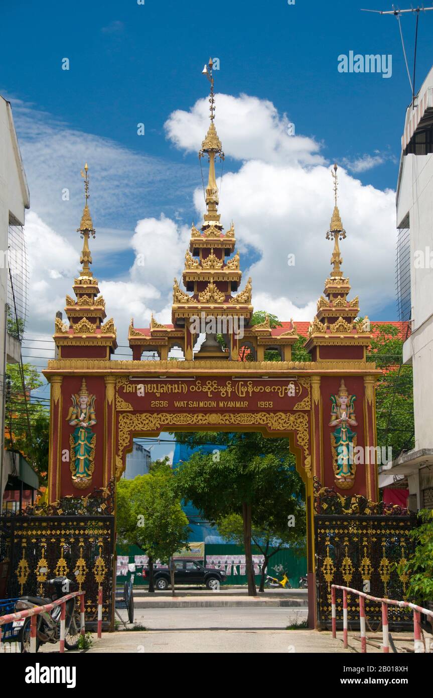 Thailand: Entrance at the Burmese temple of Wat Sai Mun Myanmar, Chiang Mai.  In the south-east corner of Chiang Mai's old city stands Wat Myanmar, a fine example of a 19th century Burmese temple which would not look out of place in Mandalay. This temple is mainly associated with the lowland Burman tradition in the city, and pictures of the Shwedagon Pagoda and Sule Pagoda in Yangon (Rangoon) adorn the walls. Stock Photo