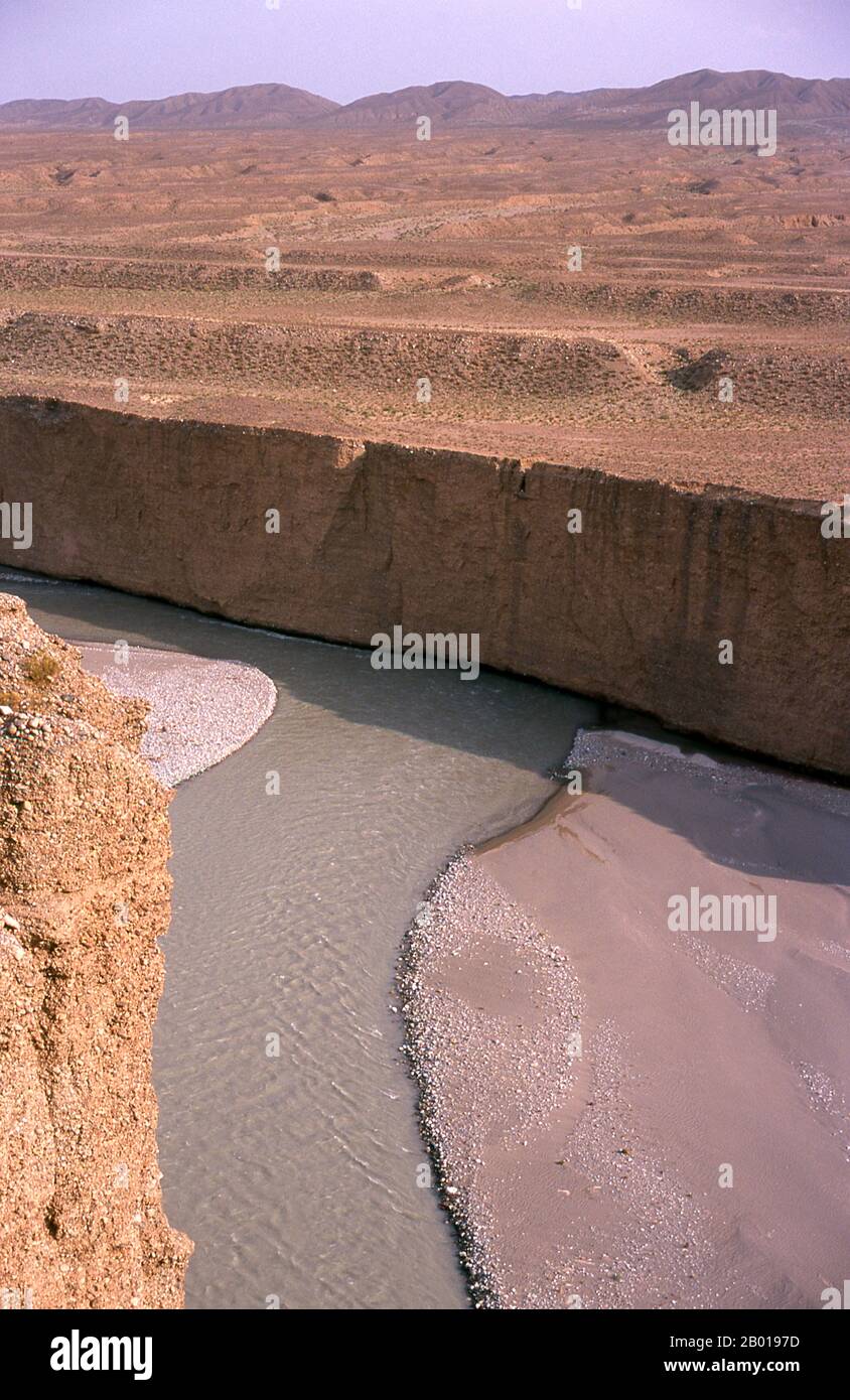 China: The Taolai River Gorge marking the end of the Ming Great Wall near Jiayuguan Fort.  Jiayuguan, the ‘First and Greatest Pass under Heaven’, was completed in 1372 on the orders of Zhu Yuanzhang, the first Ming Emperor (1368-1398), to mark the end of the Ming Great Wall. It was also the very limits of Chinese civilisation, and the beginnings of the outer ‘barbarian’ lands.  For centuries the fort was not just of strategic importance to Han Chinese, but of cultural significance as well. This was the last civilised place before the outer darkness. Stock Photo