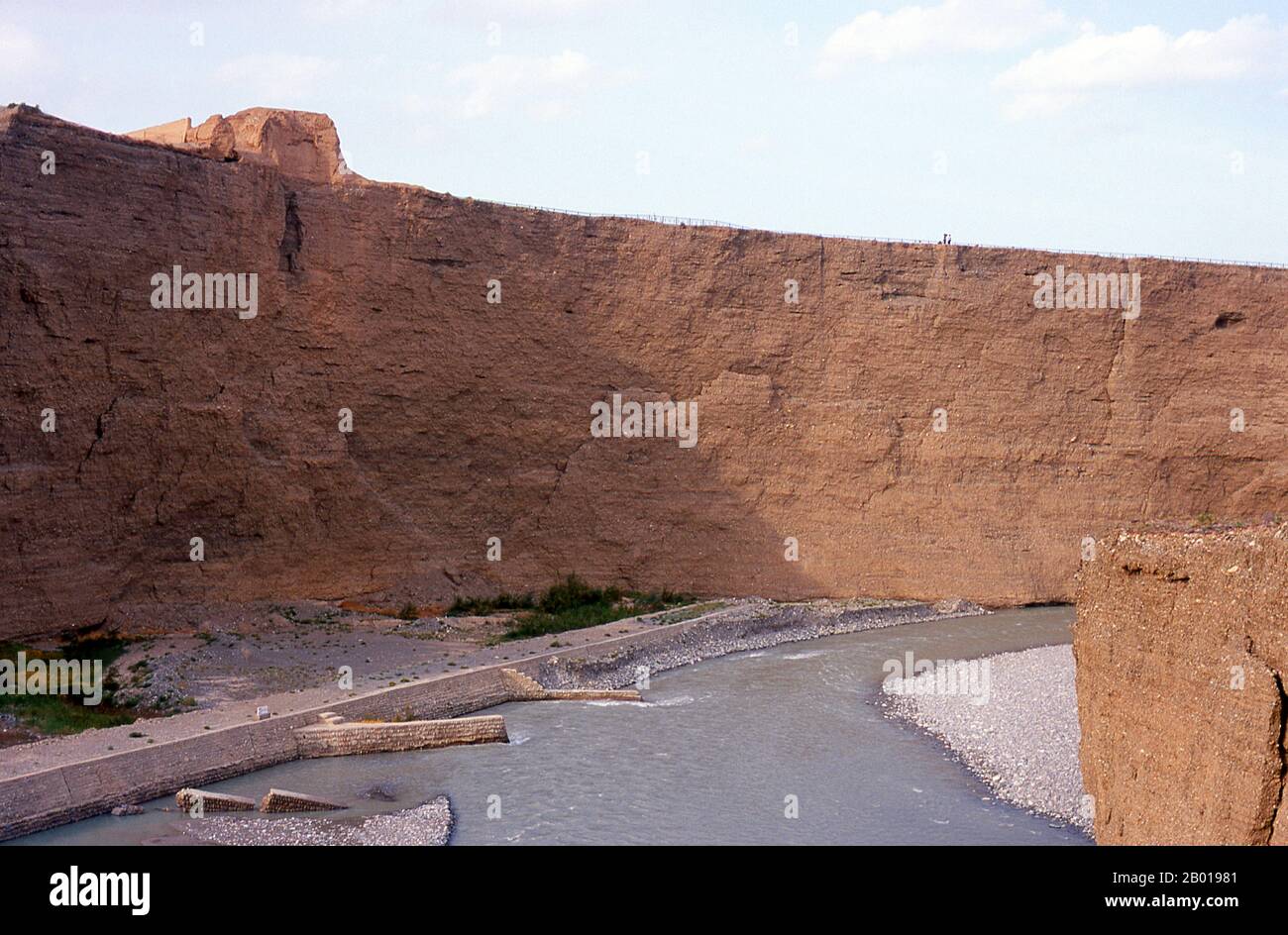 China: First Beacon Tower and the Taolai River Gorge, the end of the Ming Great Wall near Jiayuguan Fort.  Jiayuguan, the ‘First and Greatest Pass under Heaven’, was completed in 1372 on the orders of Zhu Yuanzhang, the first Ming Emperor (1368-1398), to mark the end of the Ming Great Wall. It was also the very limits of Chinese civilisation, and the beginnings of the outer ‘barbarian’ lands.  For centuries the fort was not just of strategic importance to Han Chinese, but of cultural significance as well. This was the last civilised place before the outer darkness. Stock Photo