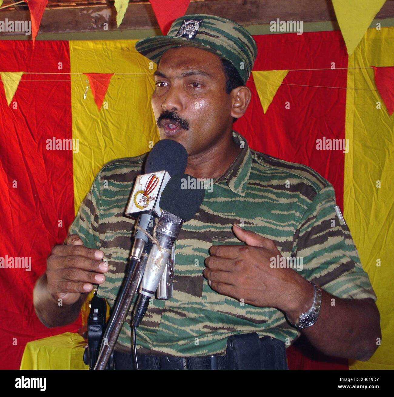 Sri Lanka: Senior LTTE Cadre K. V. Balakumaran addressing a Tamil Tiger meeting, c. 2008.  V. Balakumaran used to be one of the two senior leaders of the Eelam Revolutionary Organisation of Students (EROS). In 1990 he and a large portion of EROS members left the organisation and joined the Liberation Tigers of Tamil Eelam (LTTE). He was active in LTTE's political division. On January 29, 2009, during the last phase of the Sri Lanka Civil War, Balakumaran was seriously wounded in an assault by soldiers of the Sri Lanka army. He was captured during the last hours of the civil war. Stock Photo