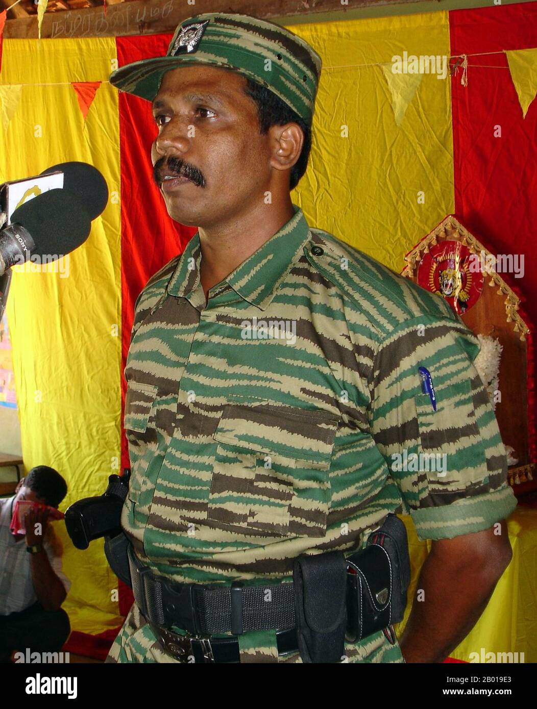 Sri Lanka: Senior LTTE Cadre Commander Colonel Ramesh addressing a Tamil Tiger gathering, c. 2008.  Colonel Ramesh was the LTTE commander for Batticaloa and Ampara districts during the 2002 ceasefire era. It is believed he was killed in May 2009 during the last phase of the Sri Lanka Civil War. Stock Photo