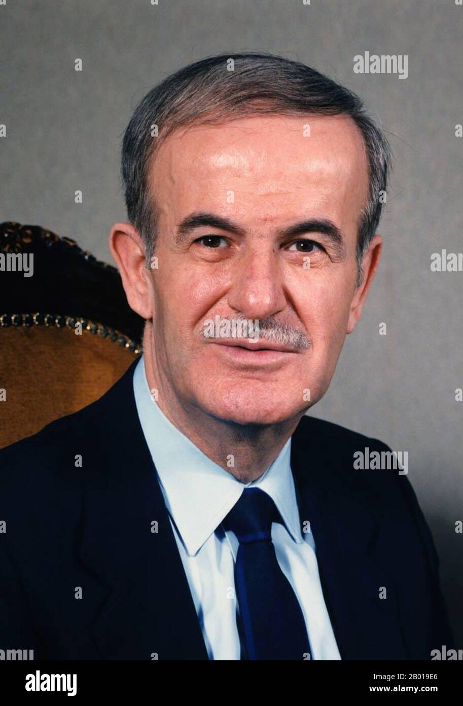 Syria: Hafez al-Assad (6 October 1930 - 10 June 2000), President of Syria (r. 1971-2000). Official portrait, c. 1987.  Hafez al-Assad was the president of Syria for three decades. Assad's rule was praised for consolidating the power of the central government after decades of coups and counter-coups. He also drew criticism for repressing his own people, in particular for ordering the Hama massacre of 1982, which has been described as the single deadliest act by any Arab government against its own people in the modern Middle East. He was succeeded by his son, Bashar al-Assad, in 2000. Stock Photo